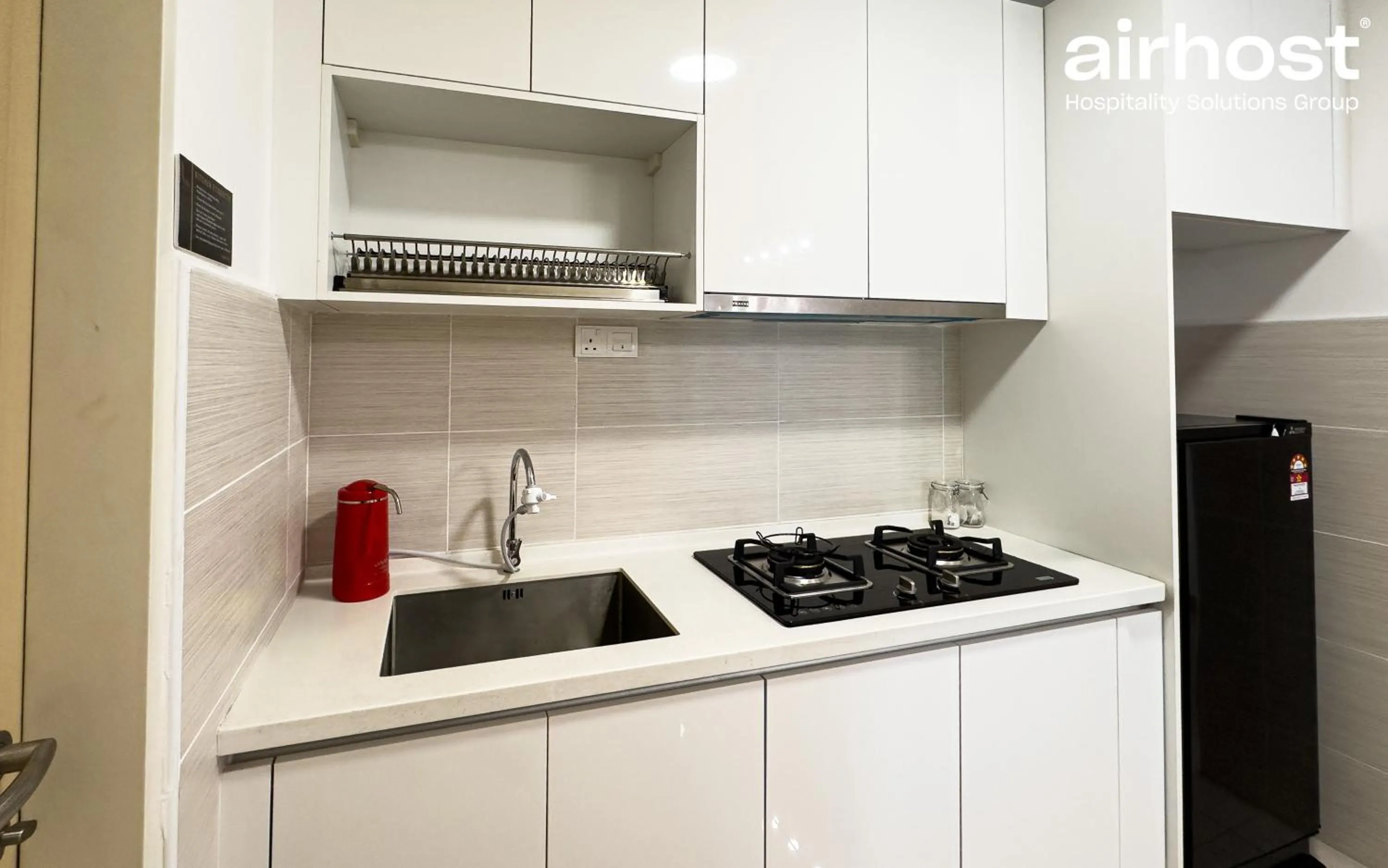 Kitchen or kitchenette in Legasi Kampung Baru by Airhost