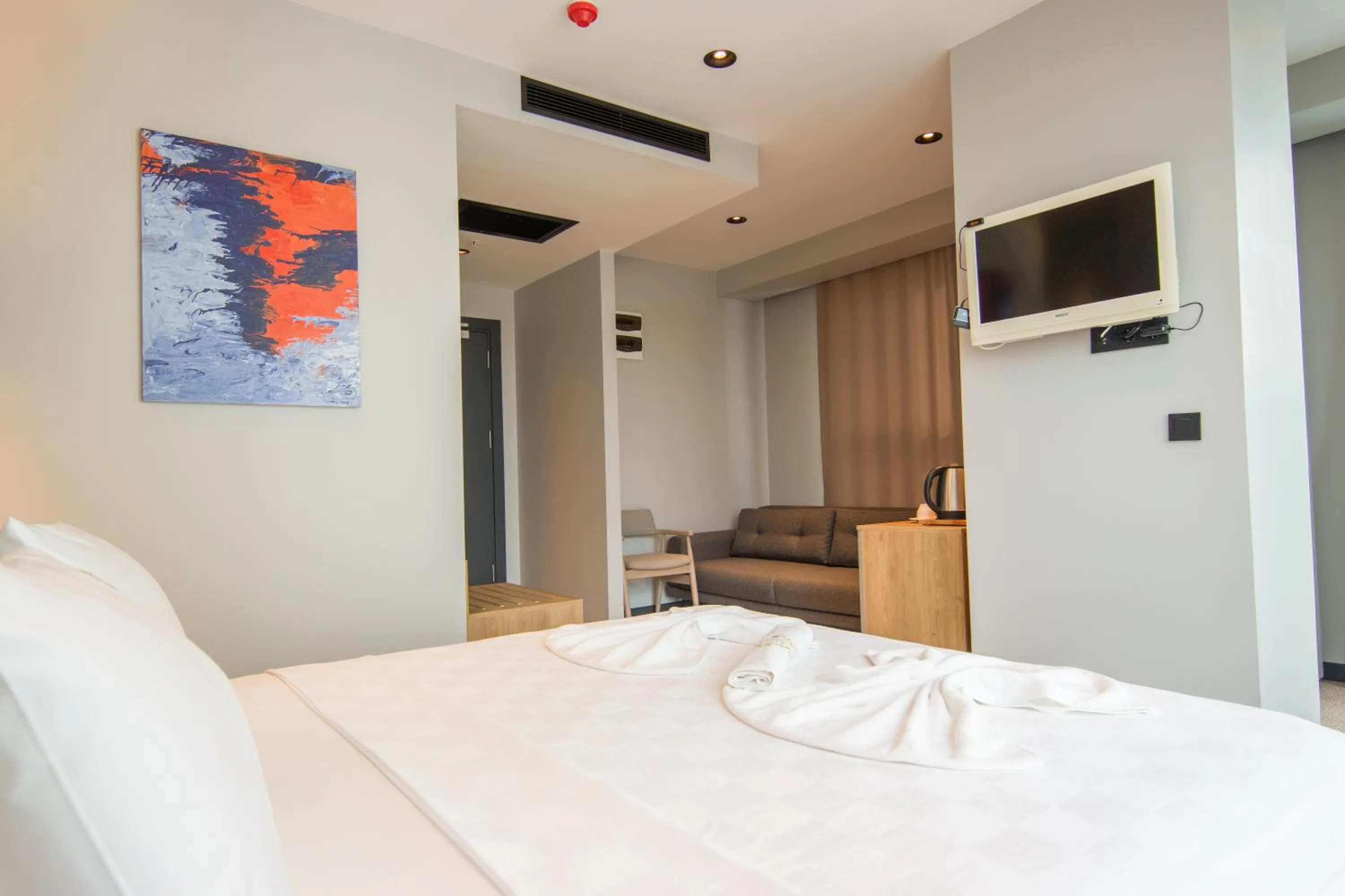 Bed in SHERLOCK HOMES HOTELS