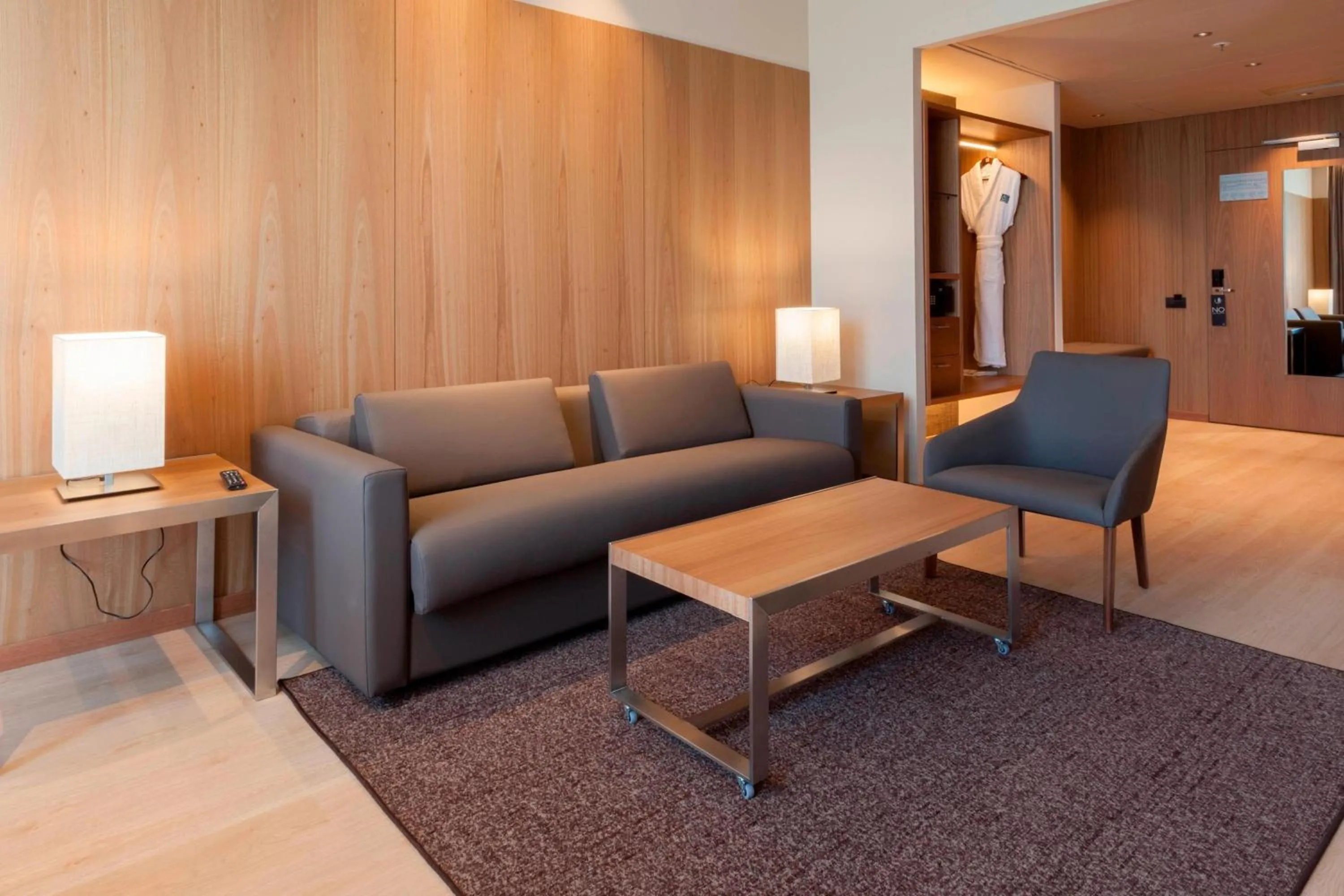 Living room in AC Hotel Diagonal L'Illa by Marriott