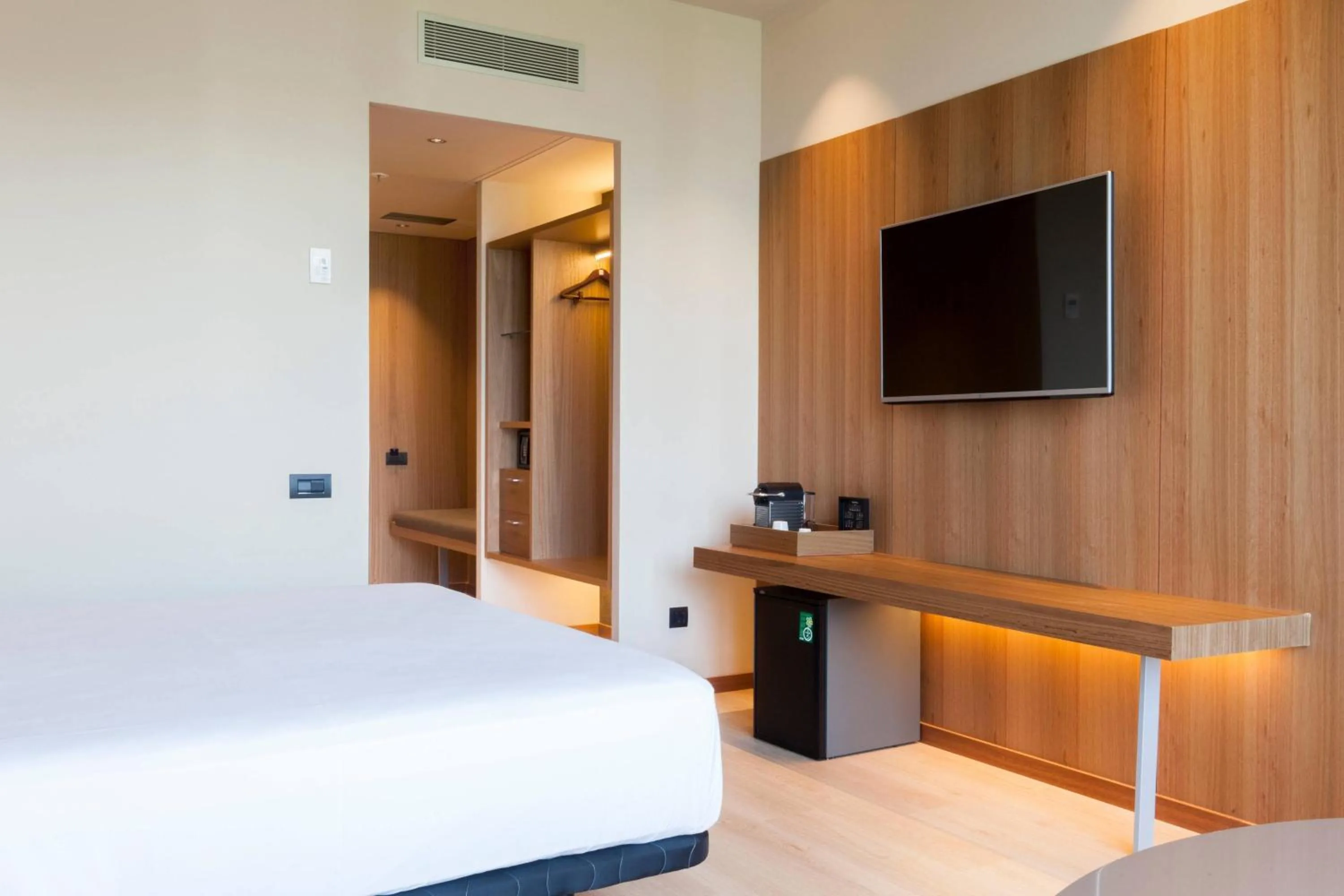 Photo of the whole room, Bed in AC Hotel Diagonal L'Illa by Marriott