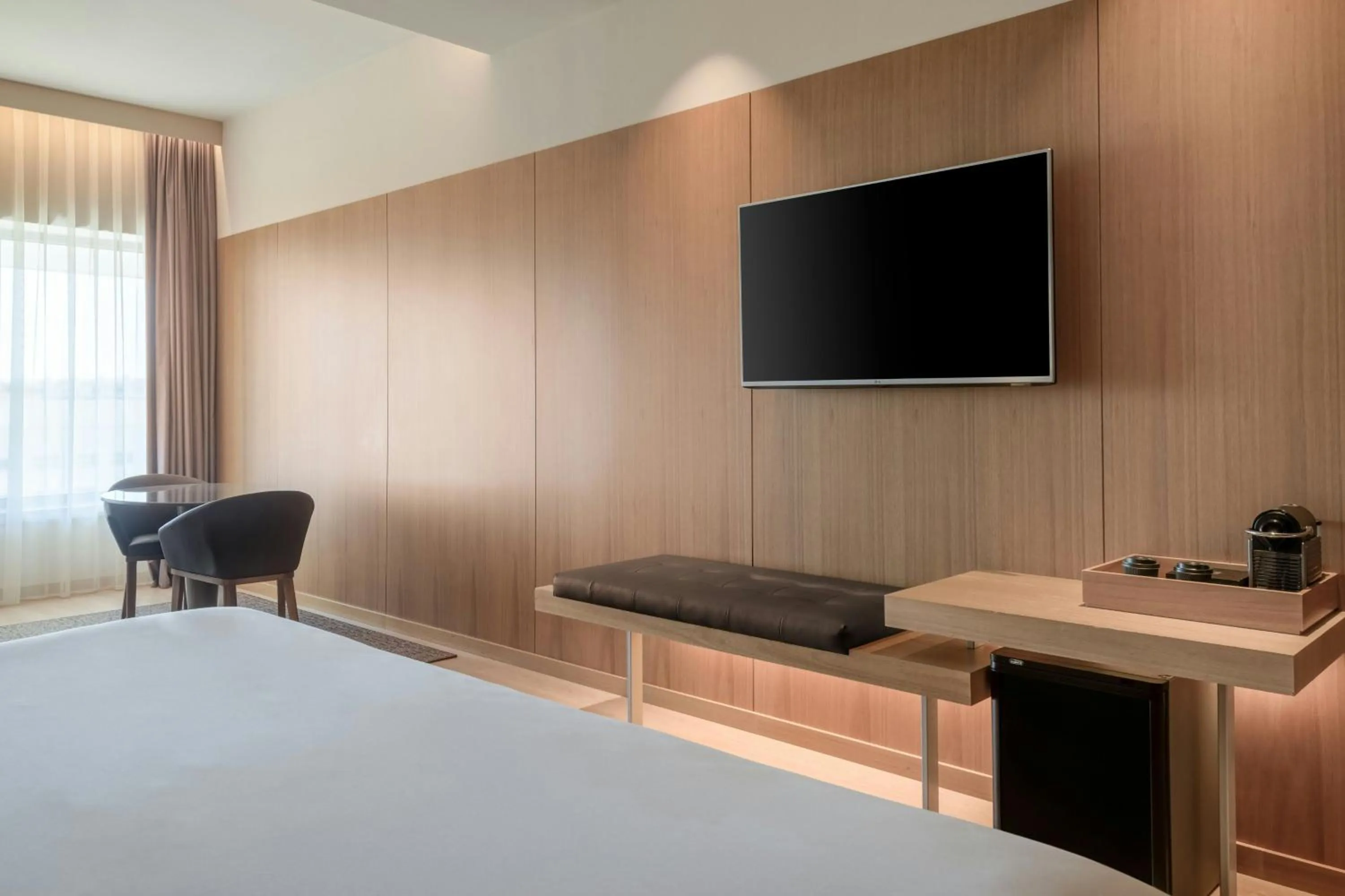 Photo of the whole room, Bed in AC Hotel Diagonal L'Illa by Marriott