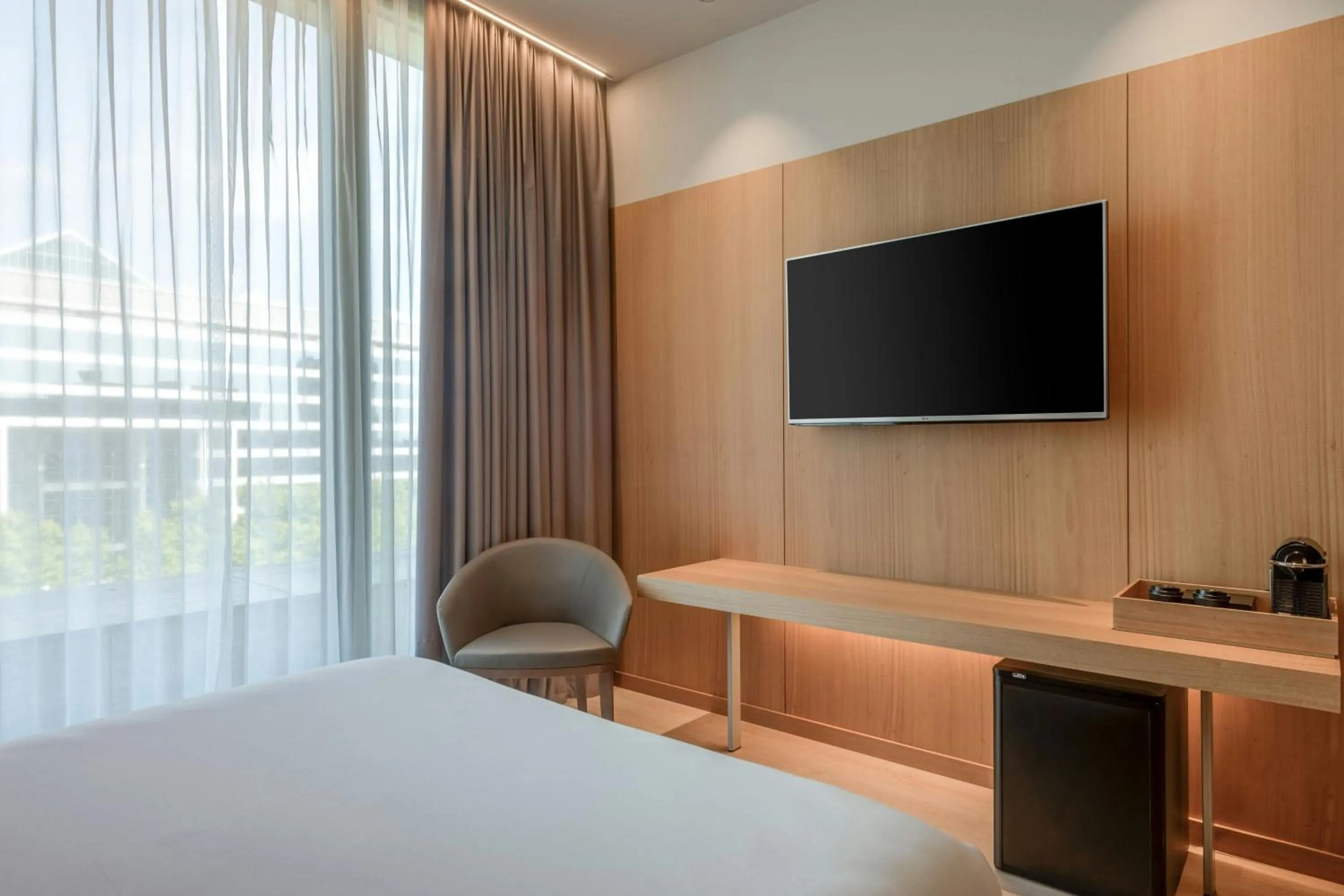 Photo of the whole room, Bed in AC Hotel Diagonal L'Illa by Marriott