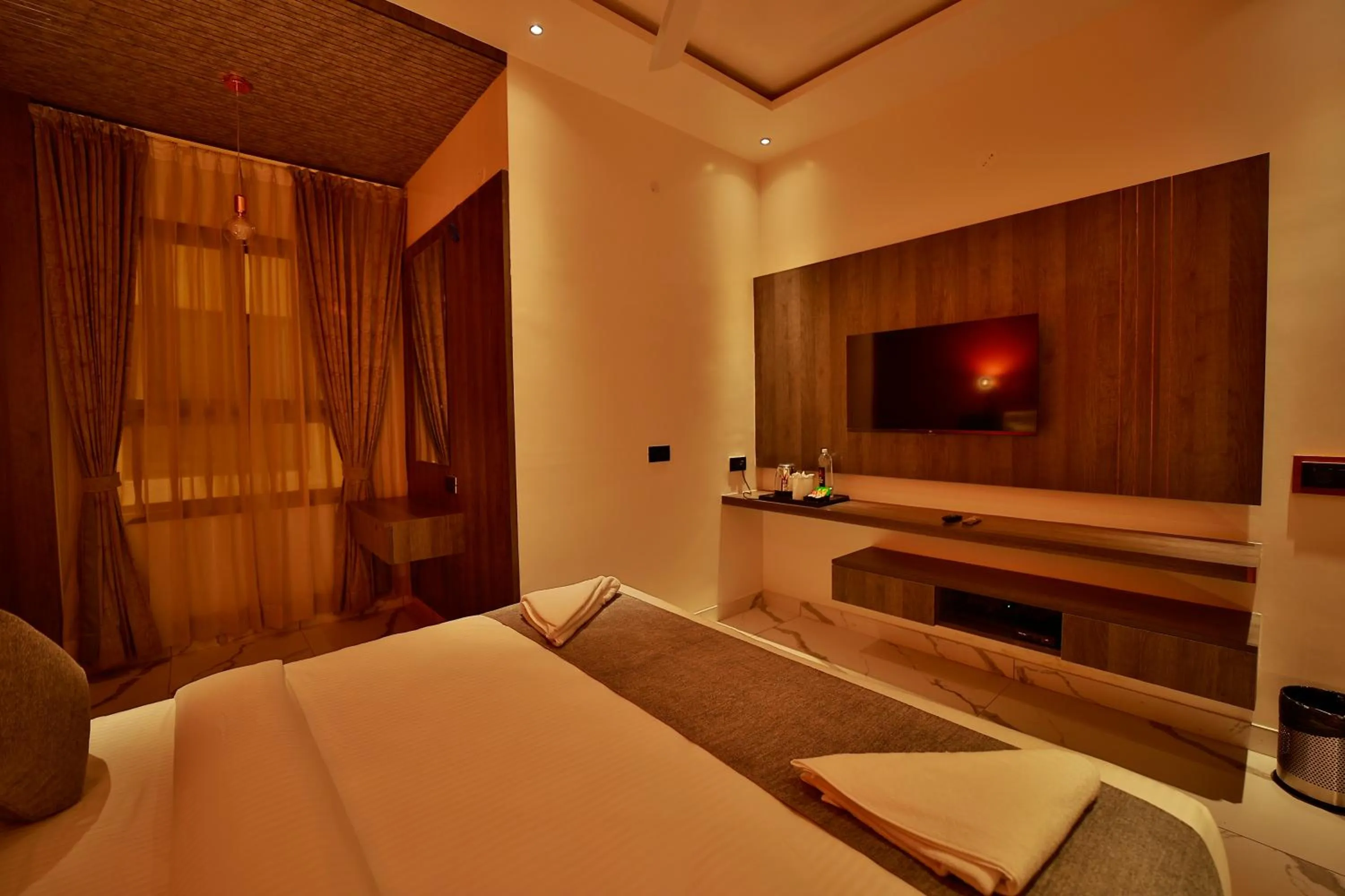 Photo of the whole room, Bed in The Mysore Grand