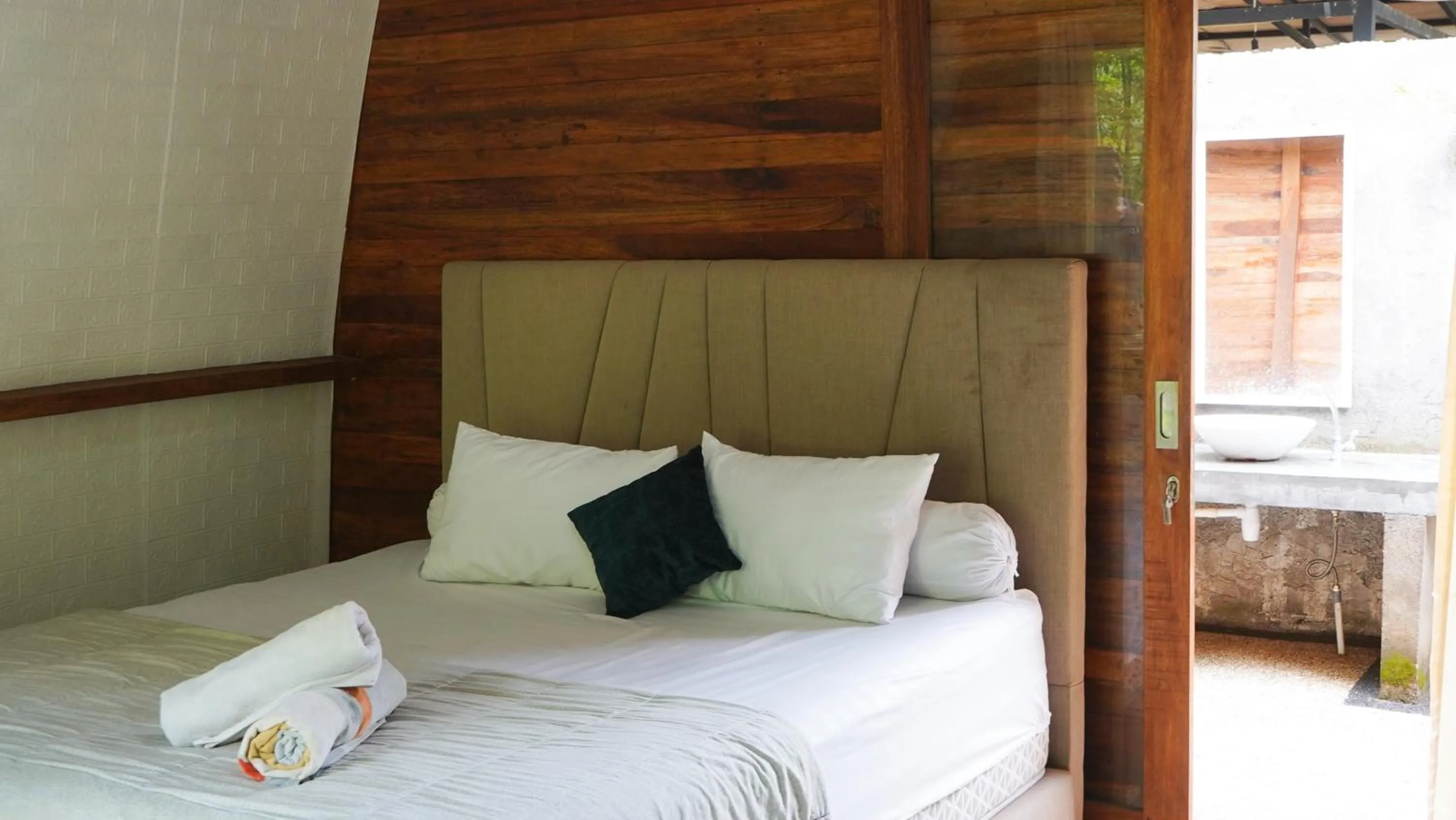 Bed in Lullabi Lumbung Villa