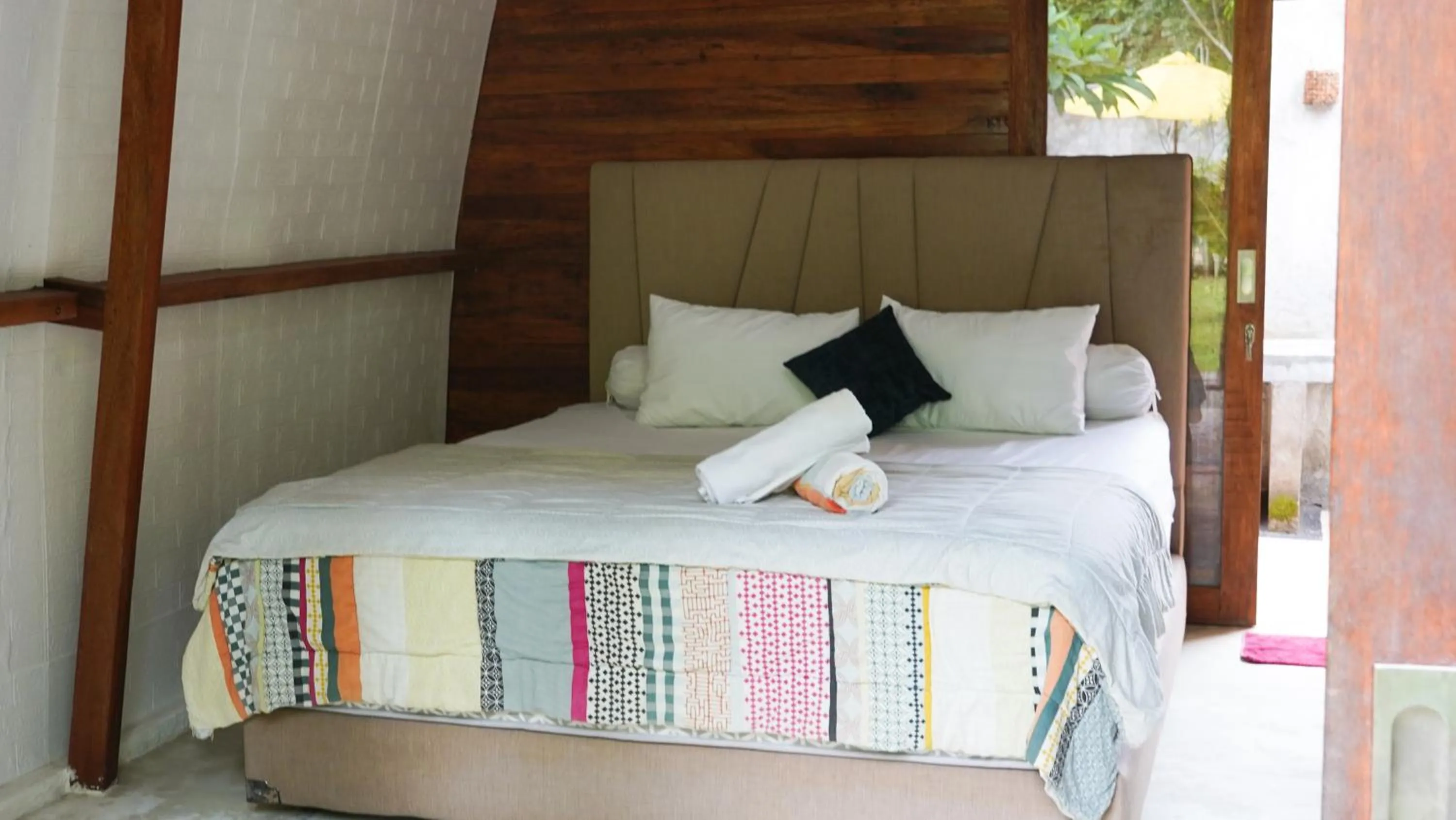 Bed in Lullabi Lumbung Villa