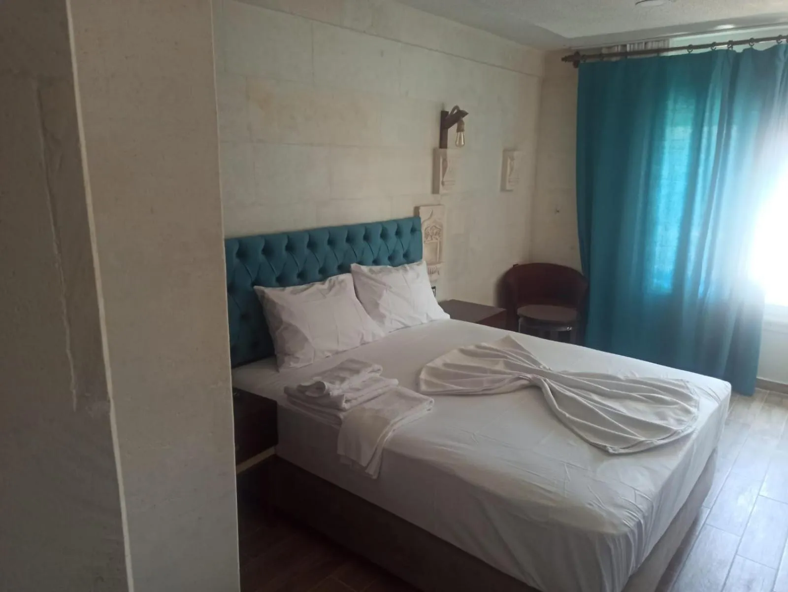 Bed in MİDYAT LADİNOS OTEL
