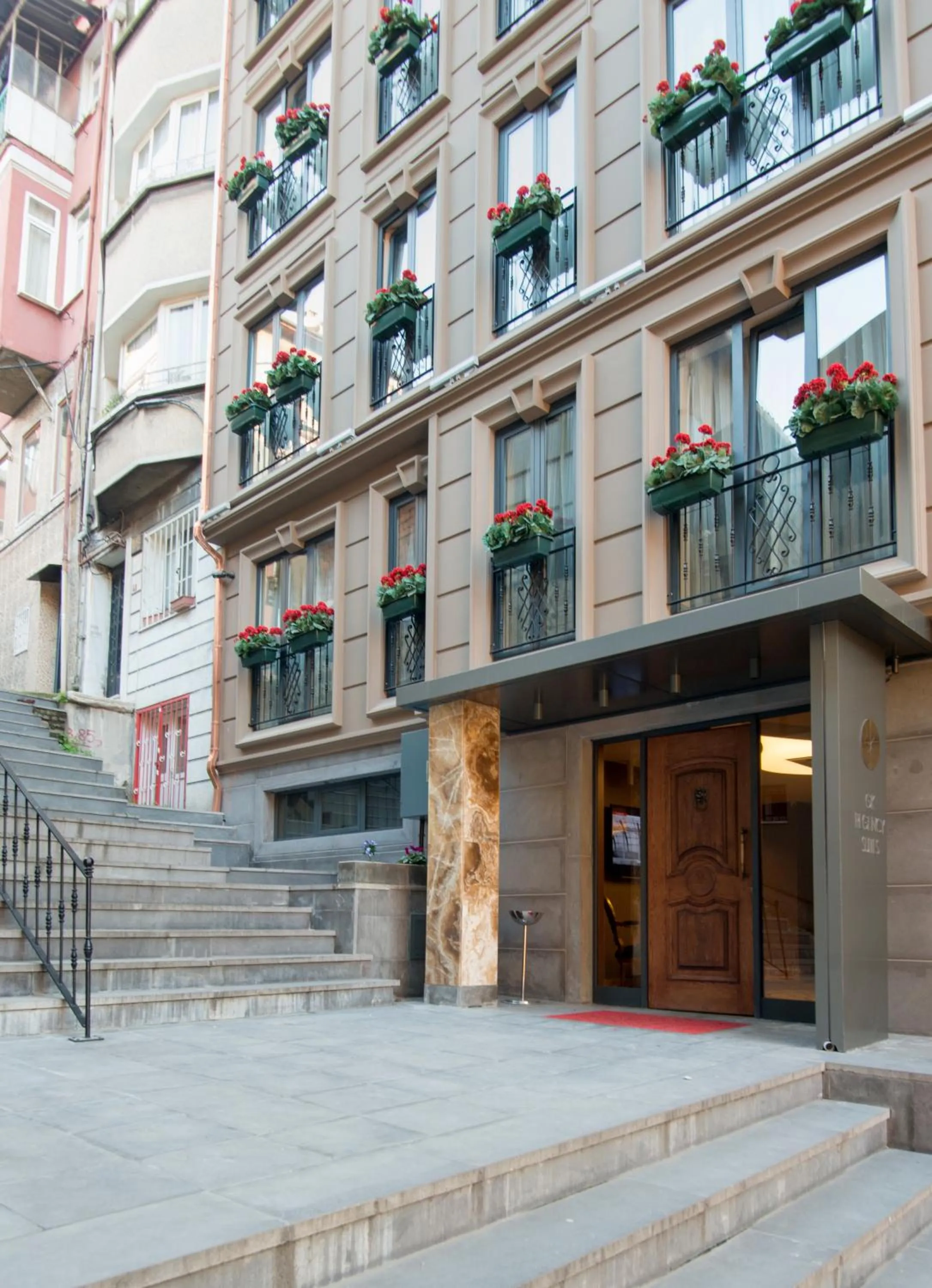 Facade/entrance in GK Regency Suites Hotel