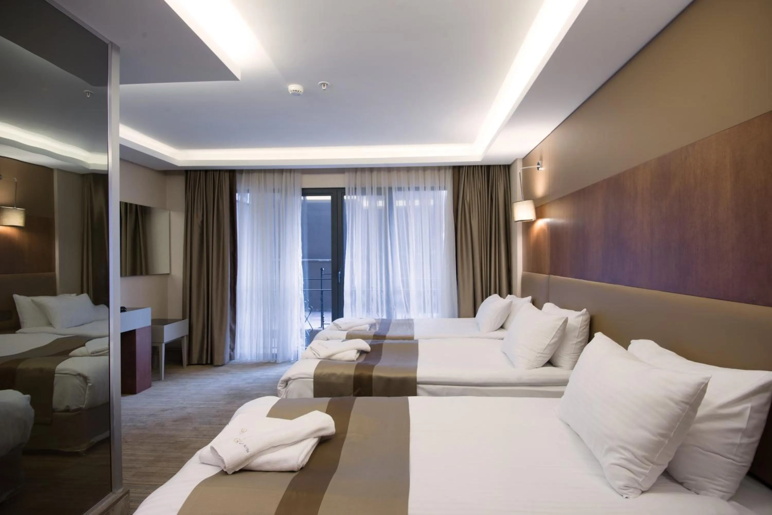 Photo of the whole room in GK Regency Suites Hotel