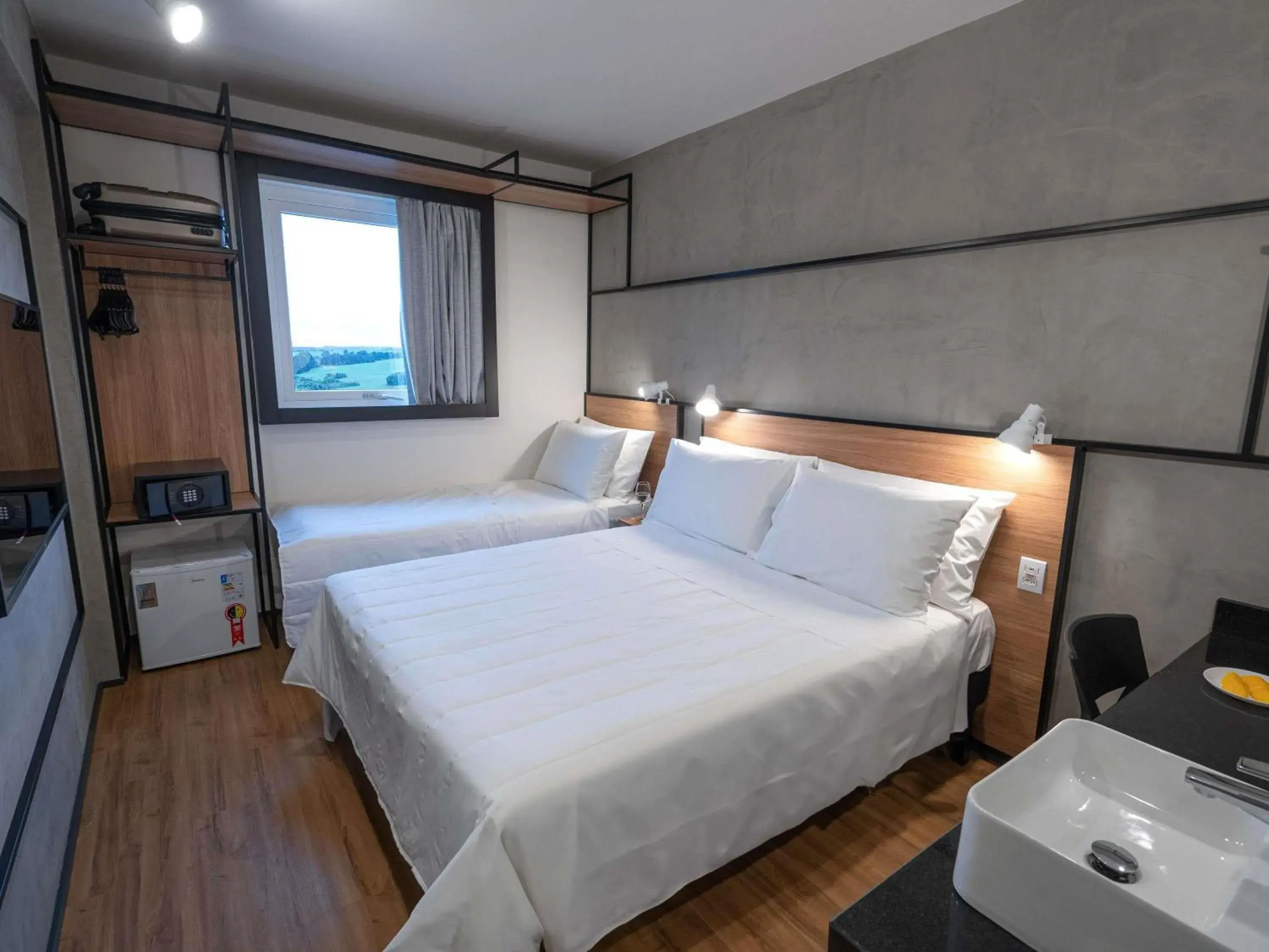 Standard Room with One Double Bed and One Single Bed - single occupancy in ibis Guarapuava Standard Room with One Double Bed and One Single Bed - single occupancy in ibis Guarapuava