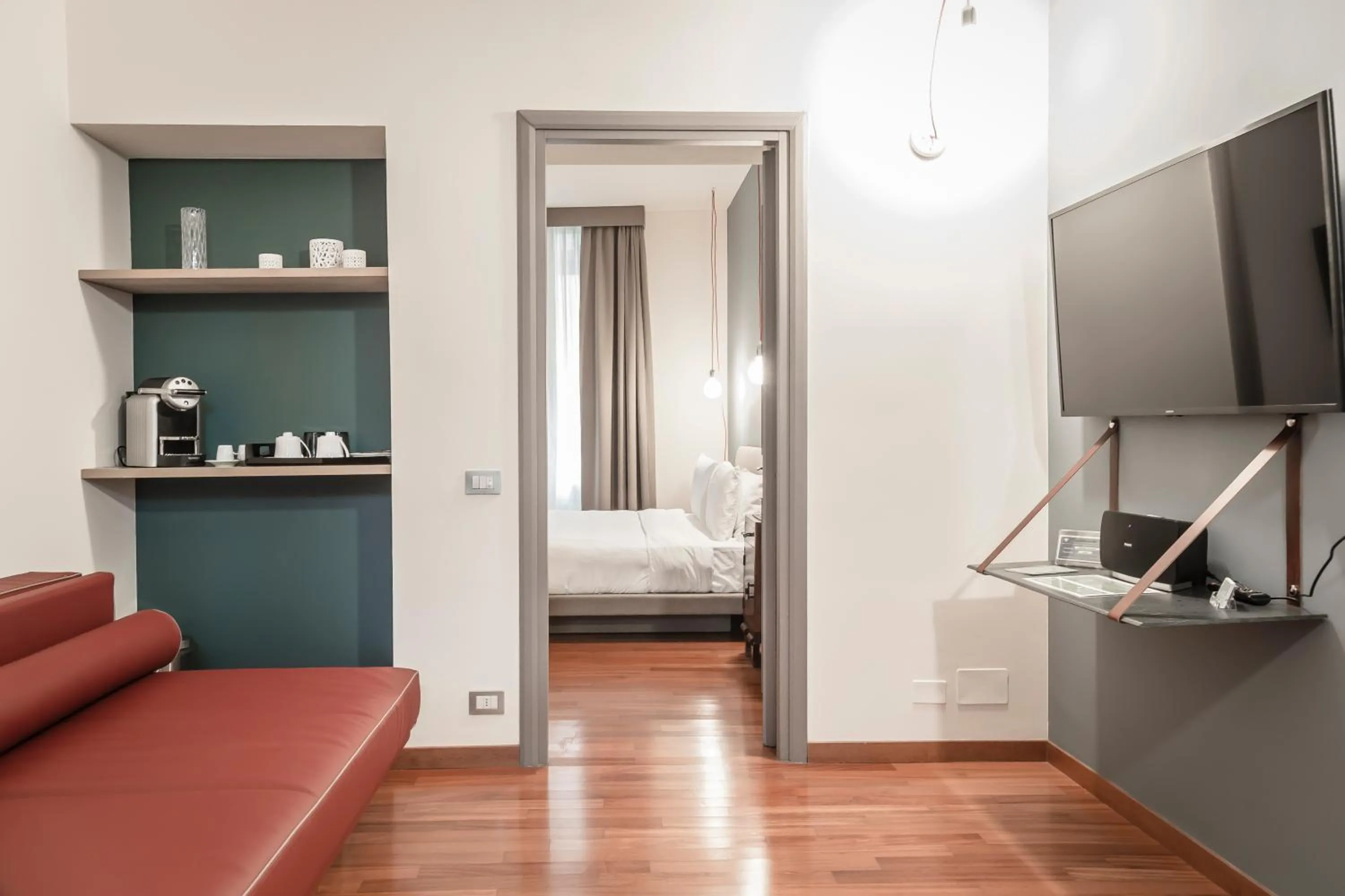 Living room, Bed in Montenapoleone Suites