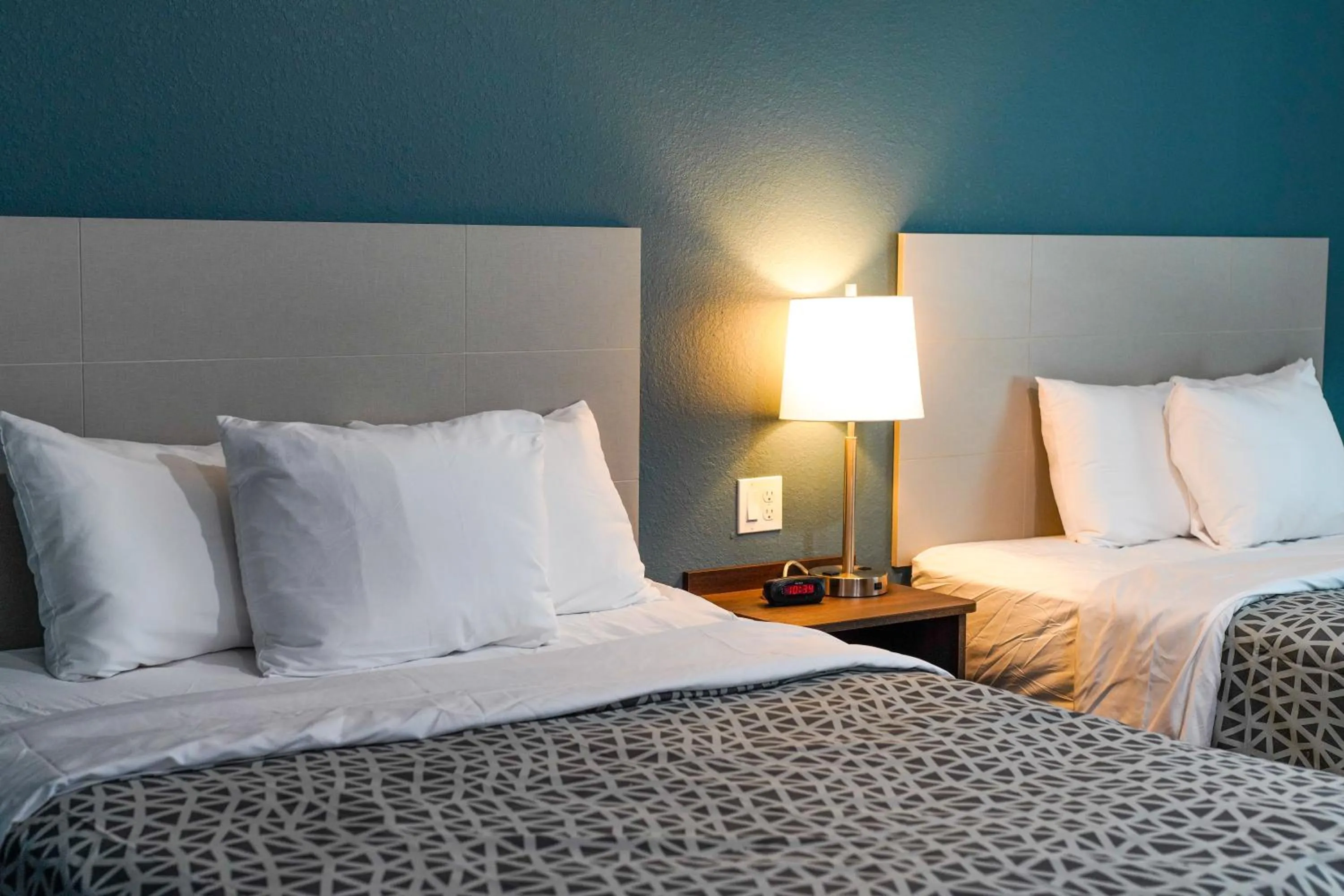 Bed in WoodSpring Suites Hudson Port Richey