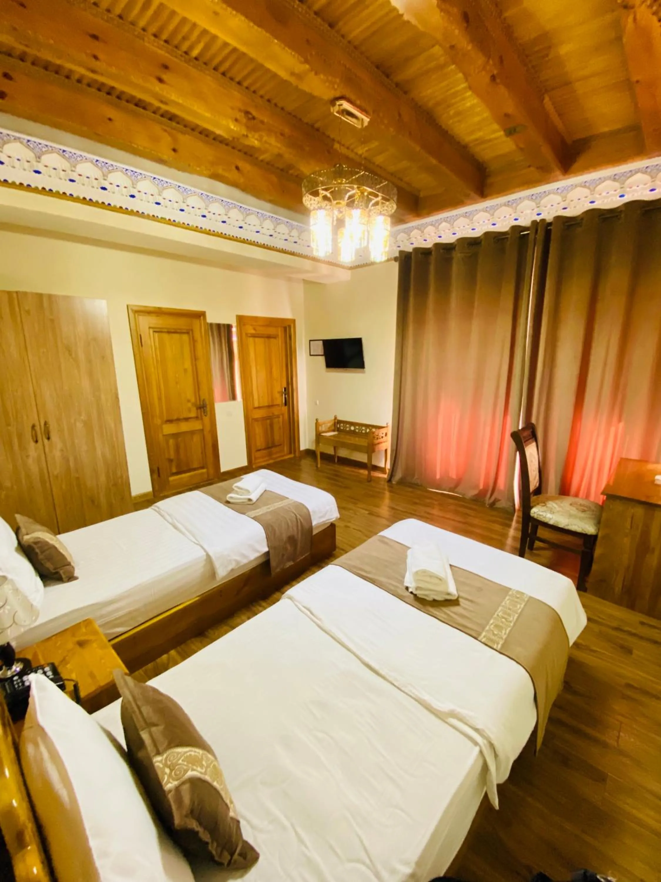 Communal lounge/ TV room in Nostalgia Boutique Hotel