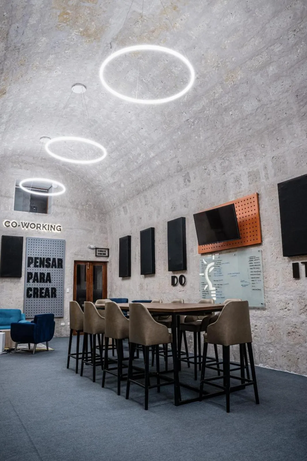 Seating area in QASA Arequipa by NOMAD