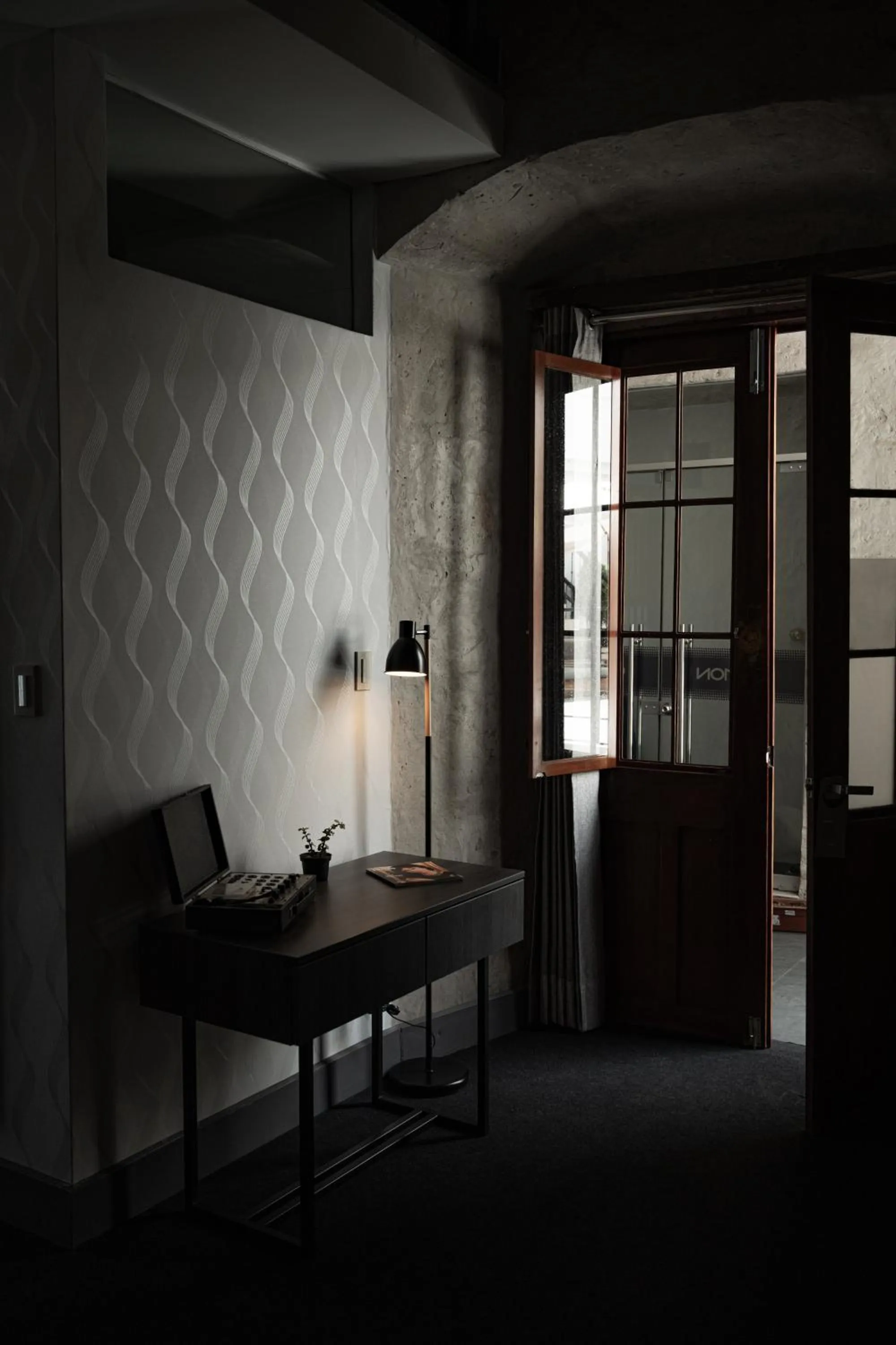 Seating area in QASA Arequipa by NOMAD