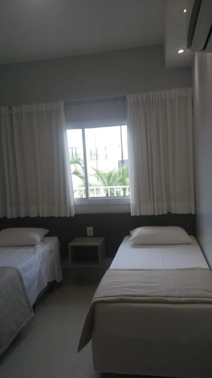 Bedroom in Lagoa Ecotowers Resort