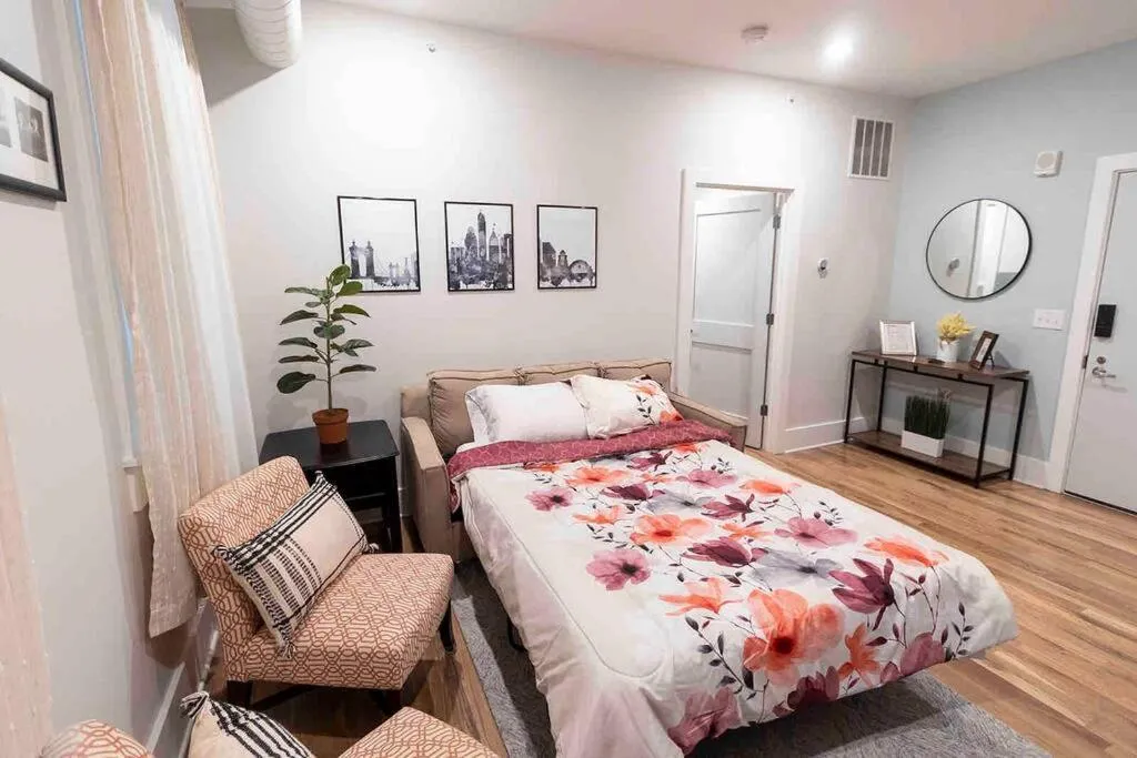 Living room, Bed in Spacious 1 bed 1 bath Downtown OTR condo minutes walk to the Reds Bengals stadium & more!