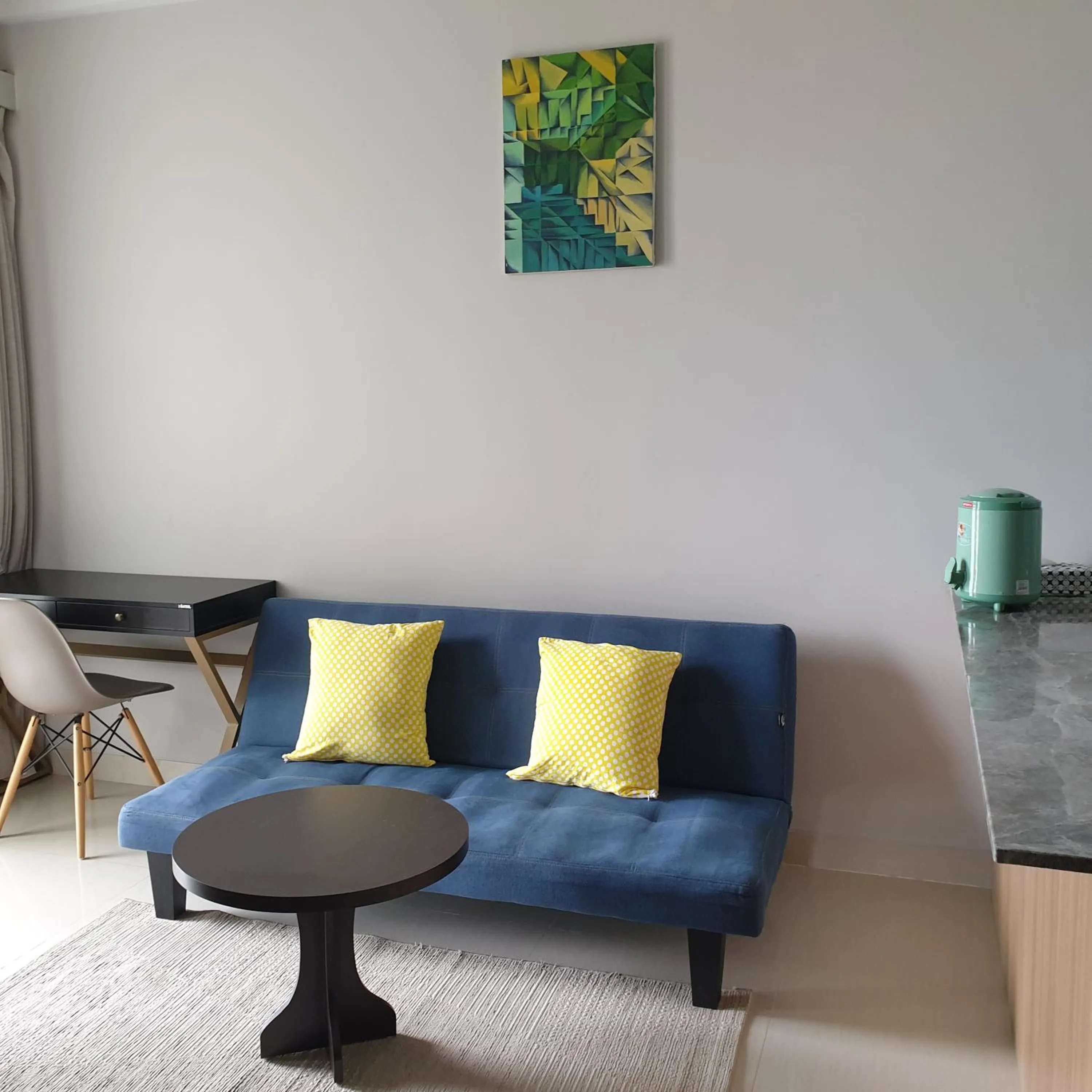 Living room in CozyHomes at One Residence Batam