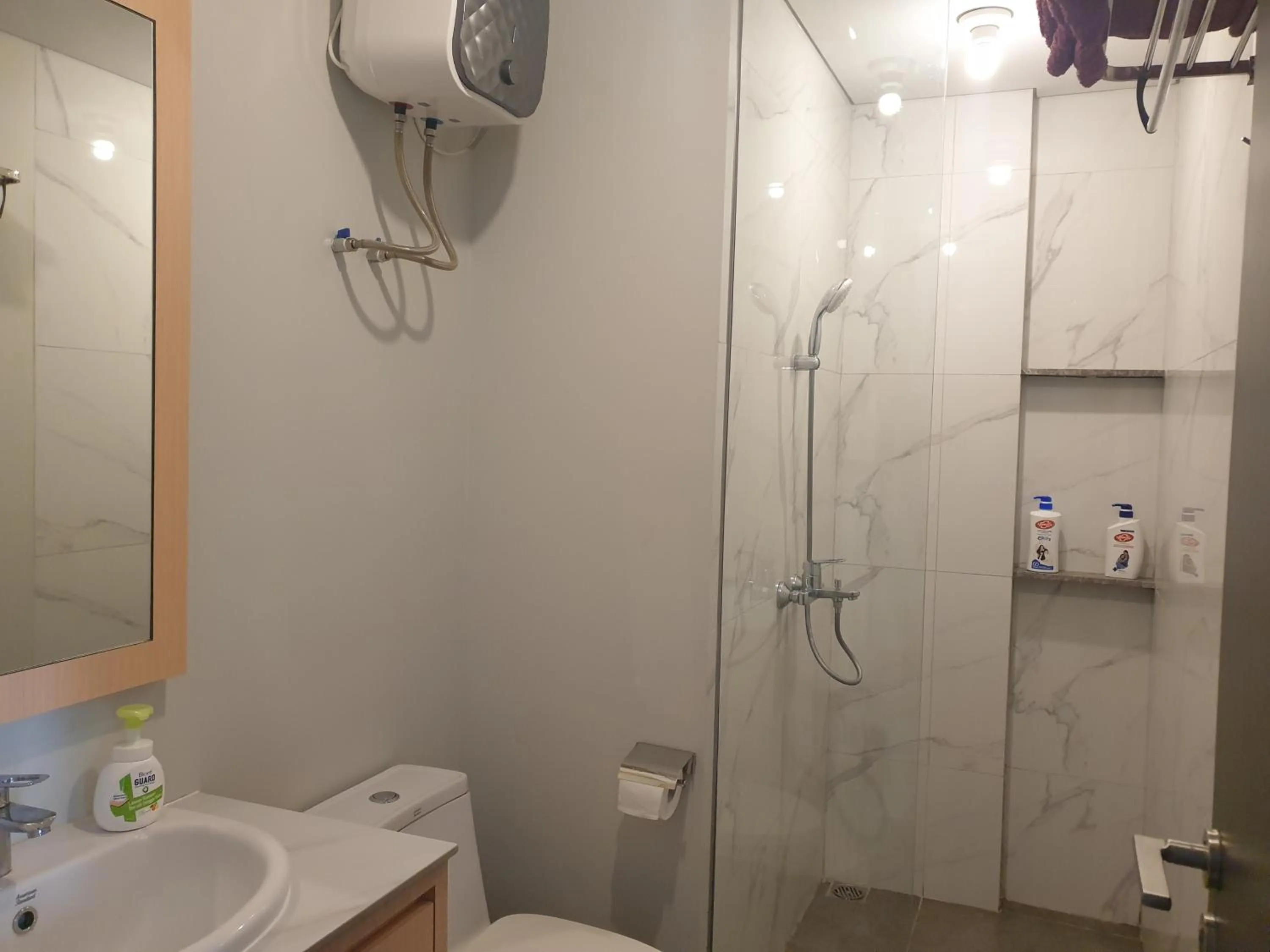 Shower in CozyHomes at One Residence Batam