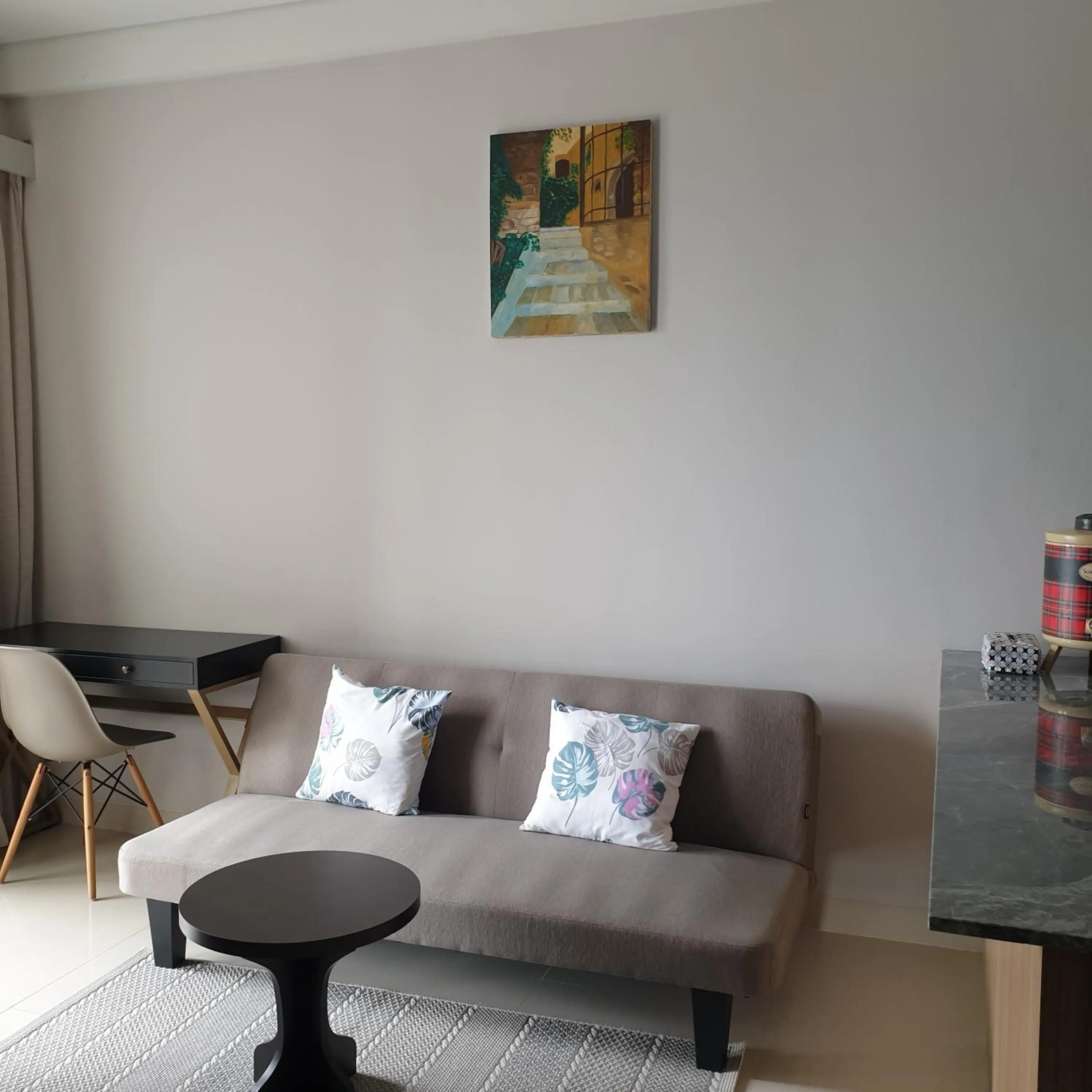 Living room in CozyHomes at One Residence Batam