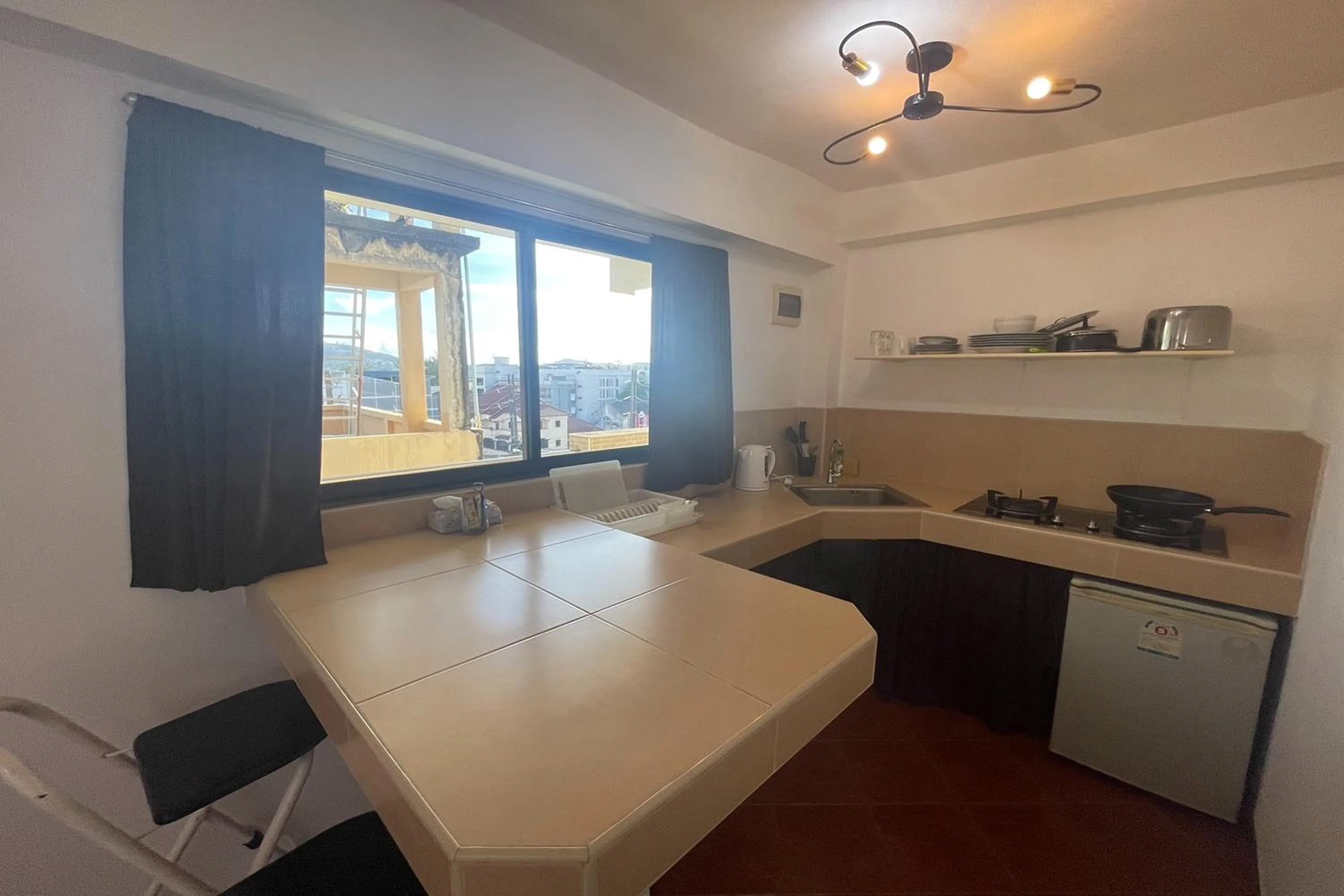 Kitchen or kitchenette in Swiss Villas Panoramic - SHA Certified
