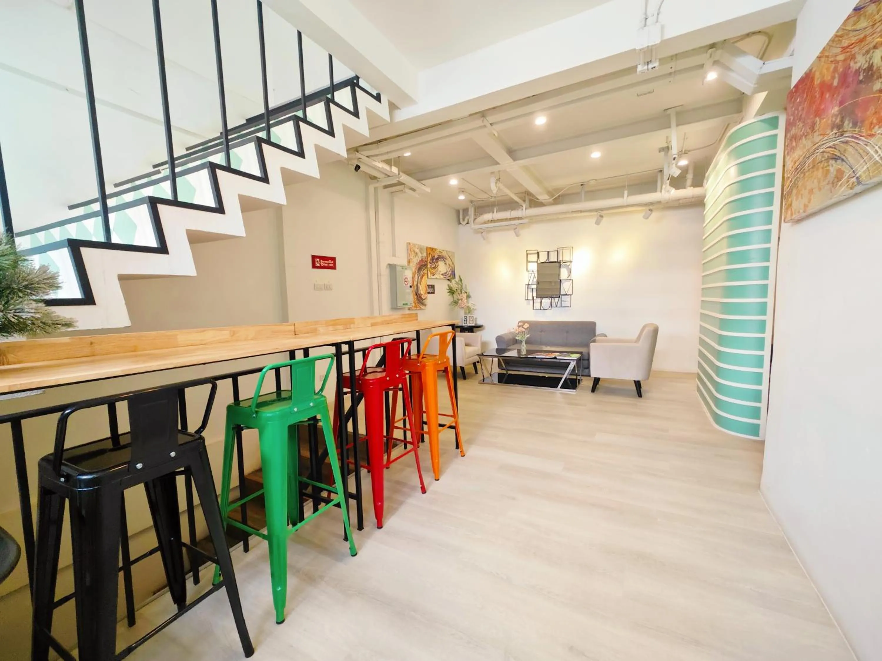 Communal lounge/ TV room in Ostay Asoke Bangkok