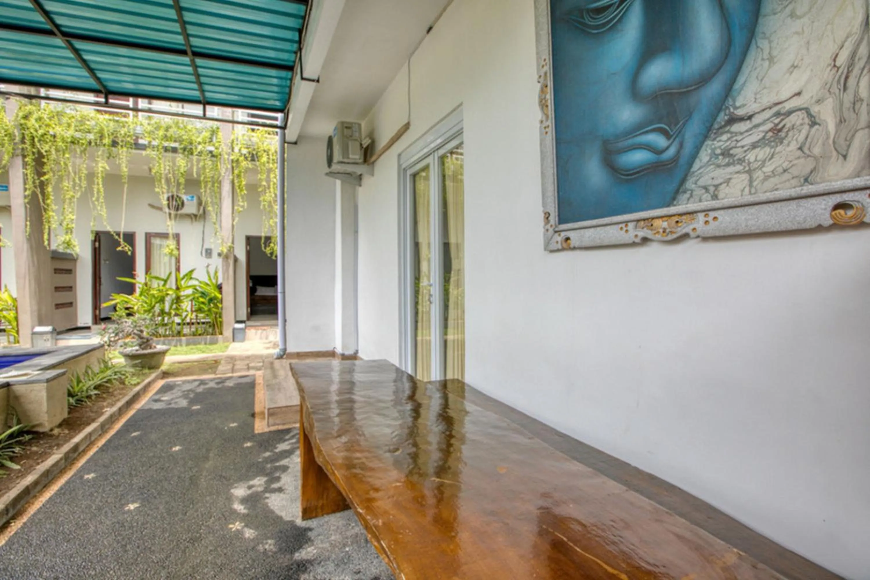 Facade/entrance in RedDoorz near Exit Toll Nusa Dua