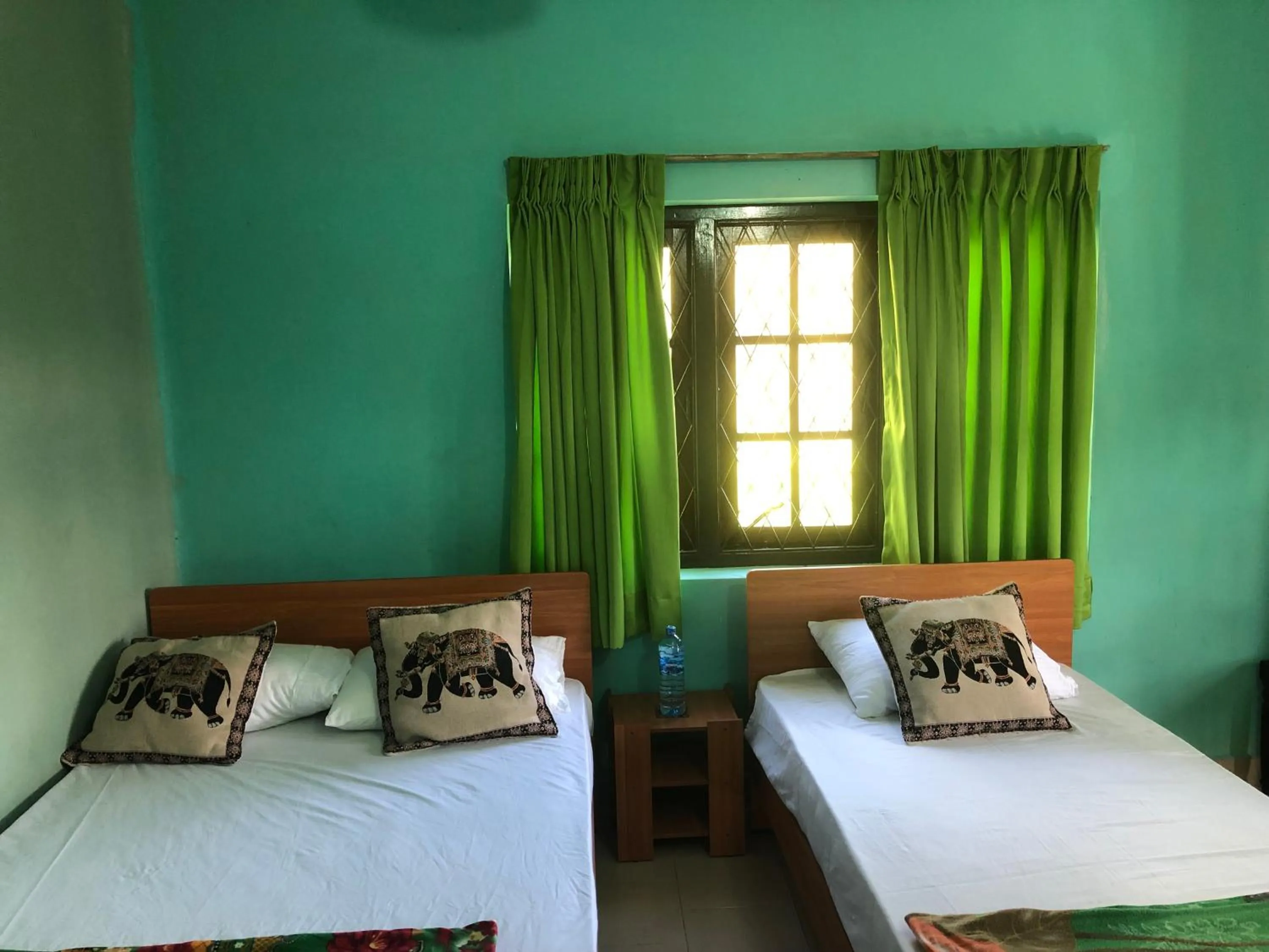 Bed in Araliya Holiday Bungalow