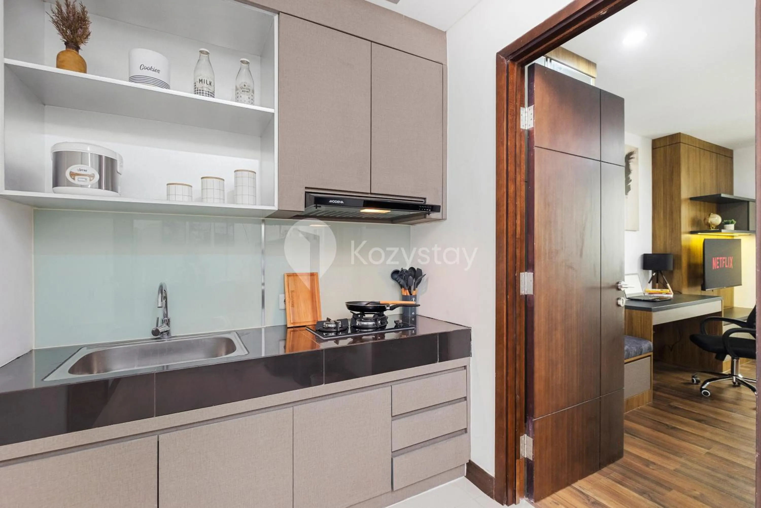 Kitchen or kitchenette in Orchid by Kozystay - Kebon Jeruk