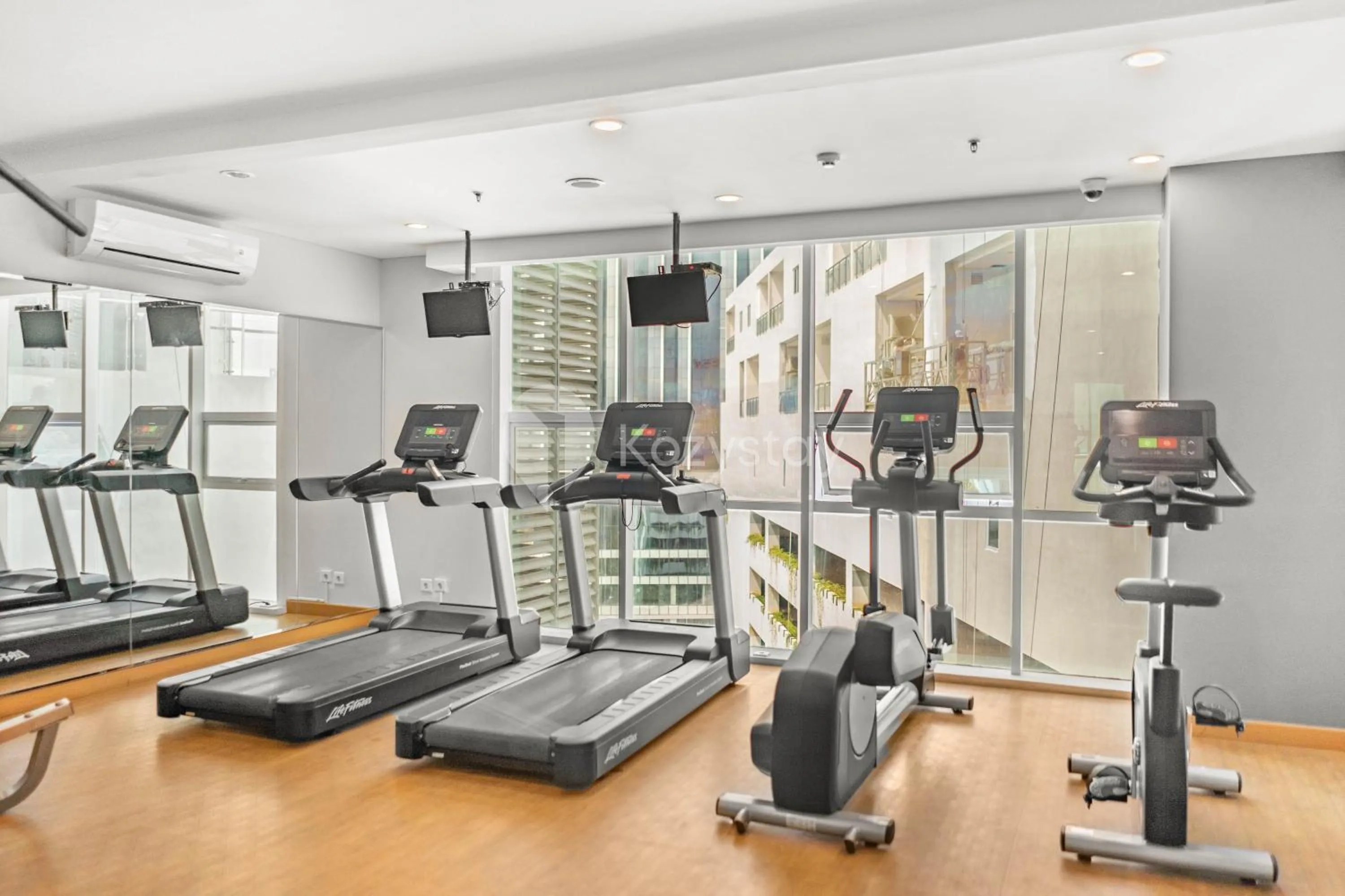 Fitness centre/facilities in Orchid by Kozystay - Kebon Jeruk