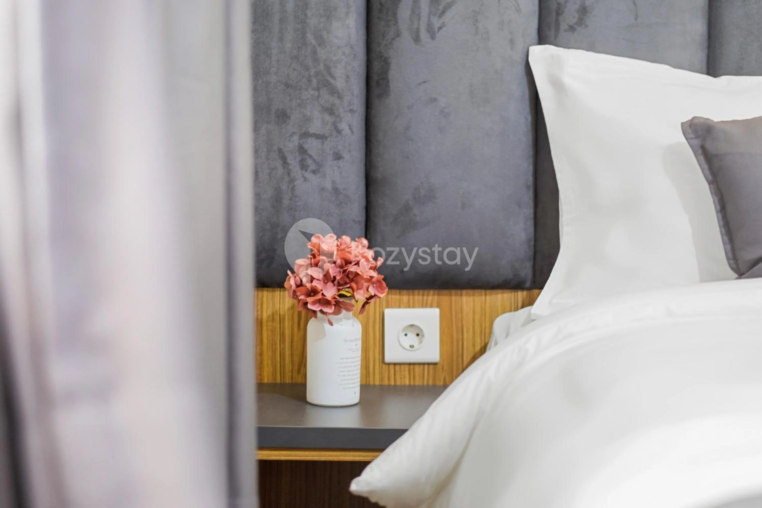 Bedroom, Bed in Orchid by Kozystay - Kebon Jeruk