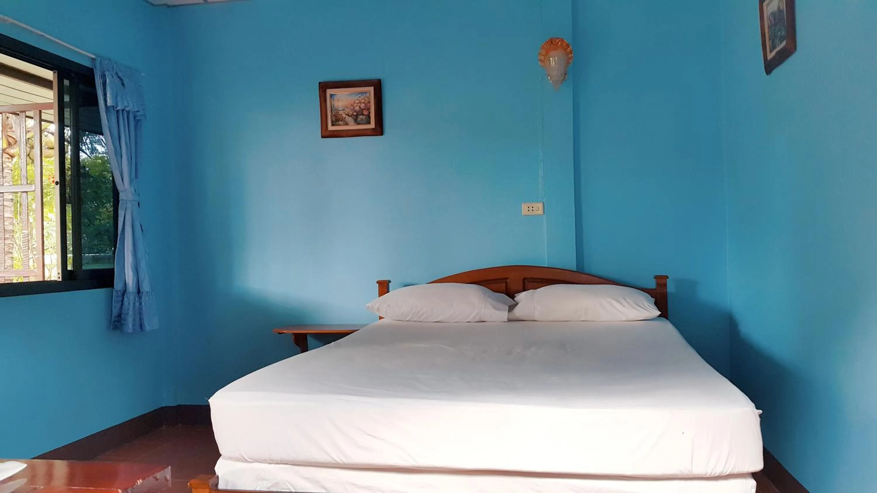 Bed in Warakorn Baansuan Amphawa