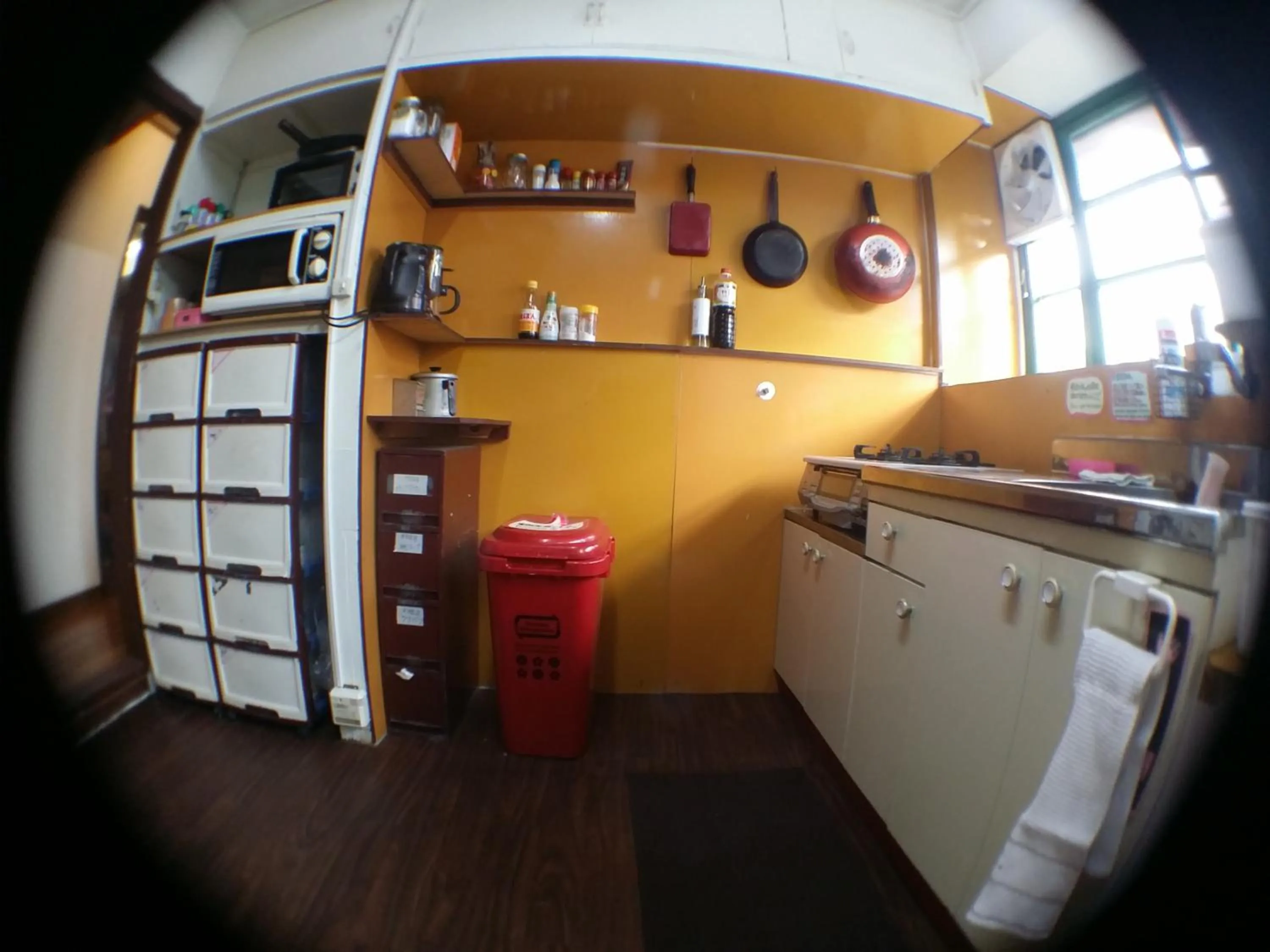 Communal kitchen in Guesthouse Base Okinawa
