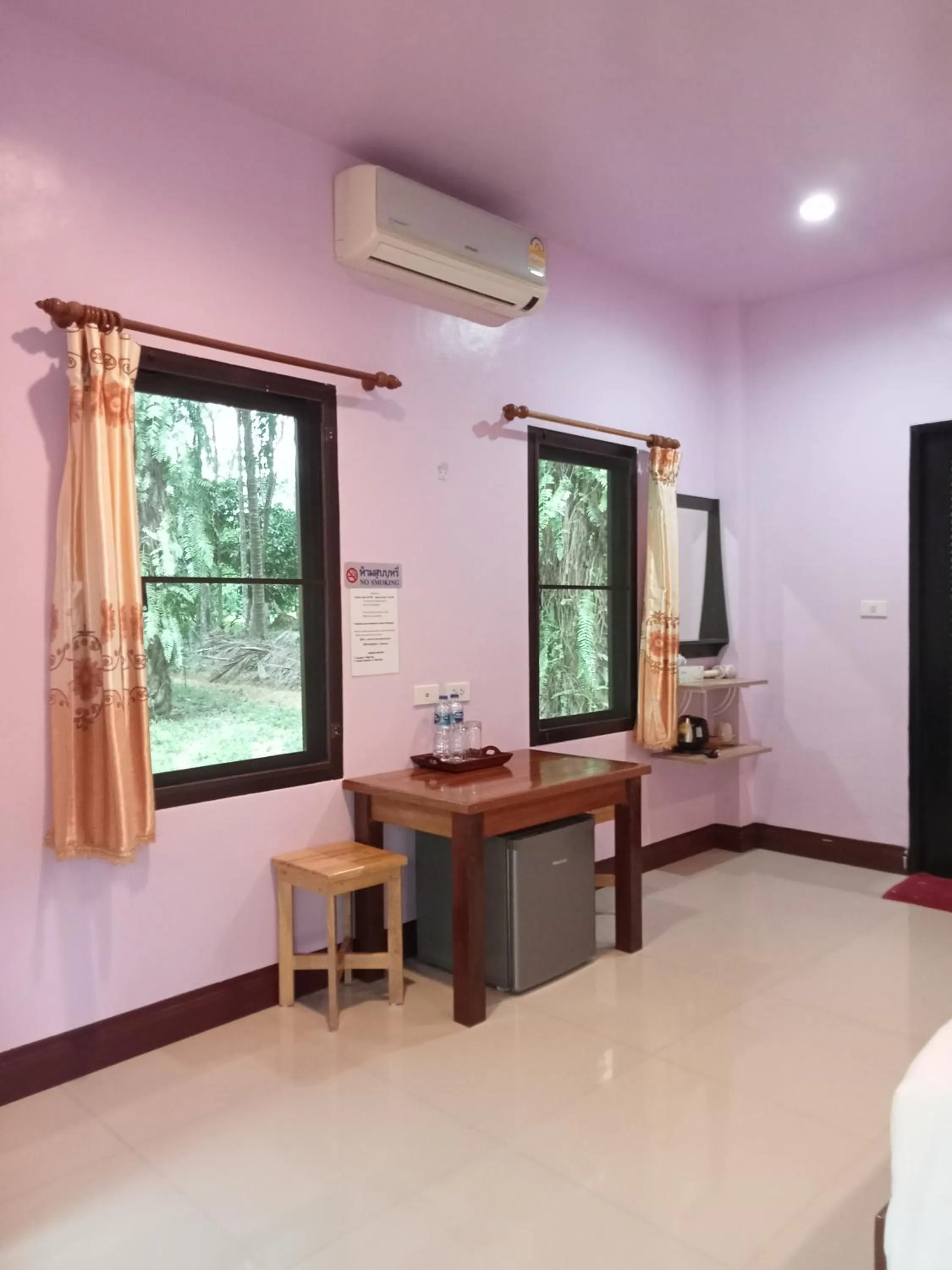 Bed in Khao Sok Palm Garden Resort