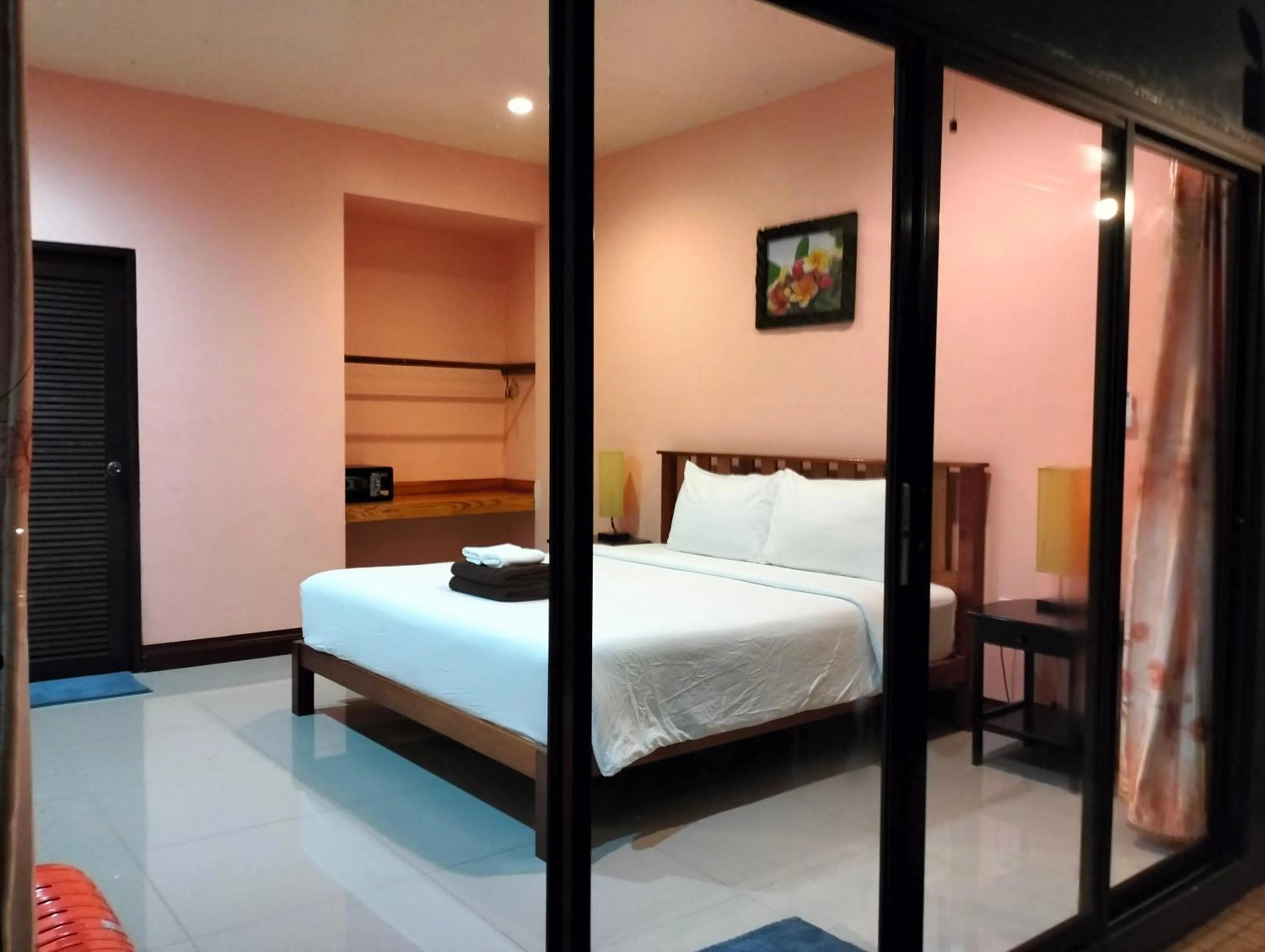 Bed in Khao Sok Palm Garden Resort