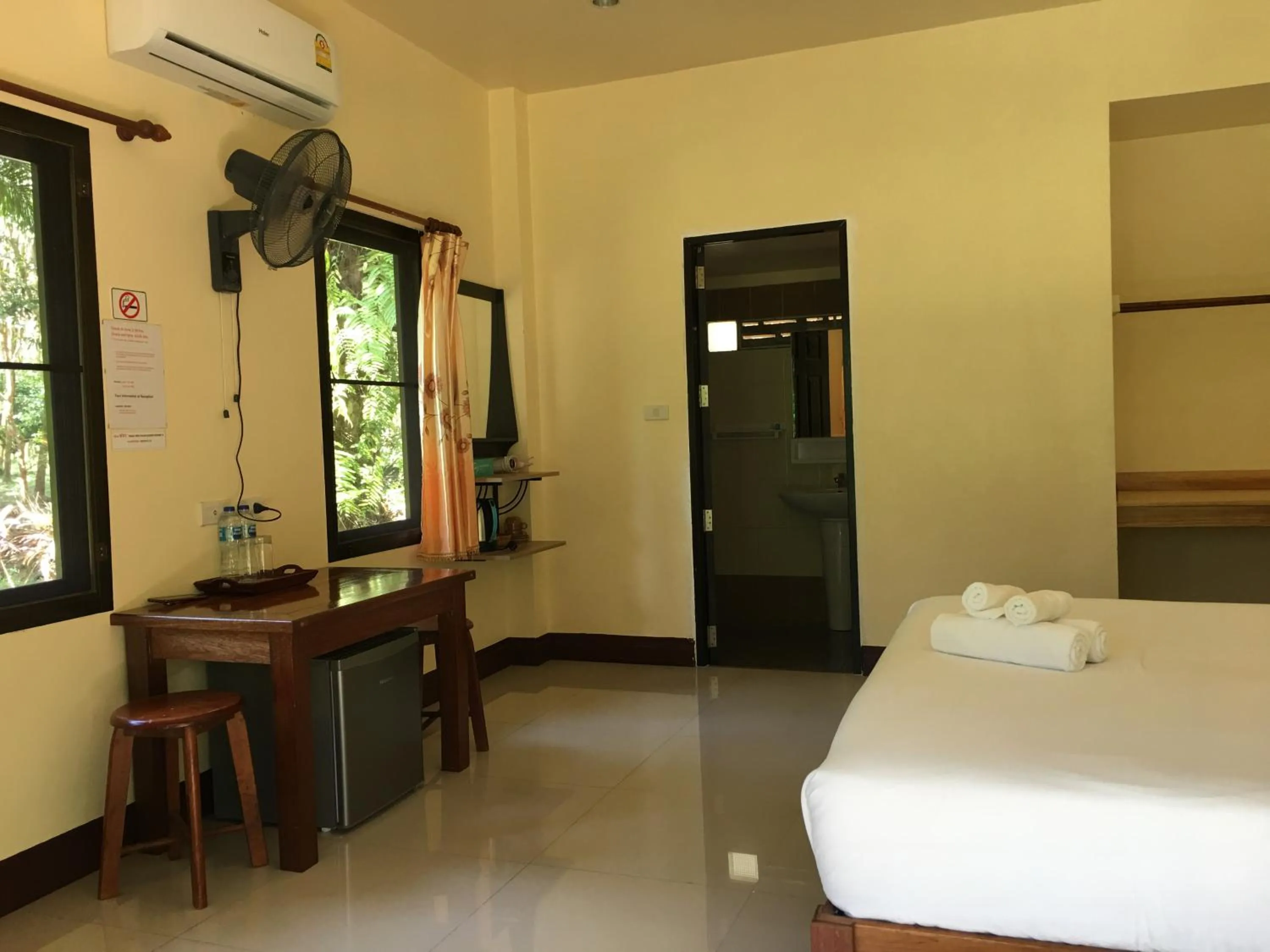 Photo of the whole room, Bed in Khao Sok Palm Garden Resort