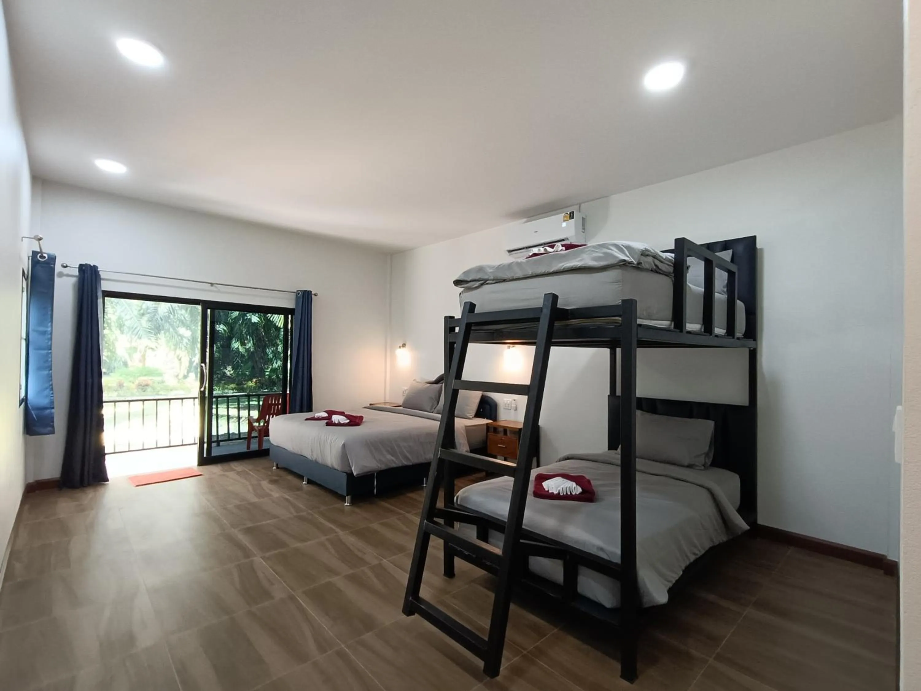 Bed in Khao Sok Palm Garden Resort