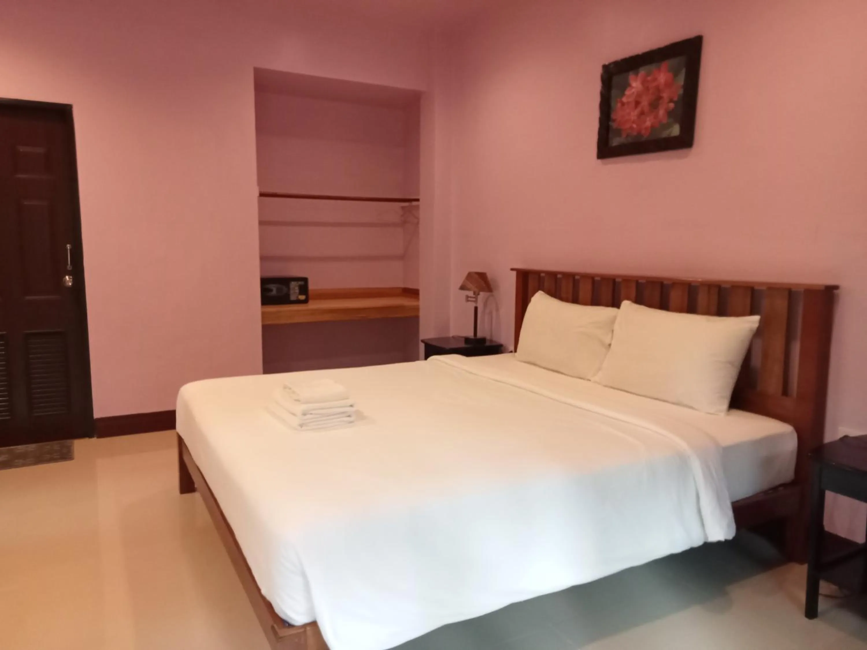 Bed in Khao Sok Palm Garden Resort