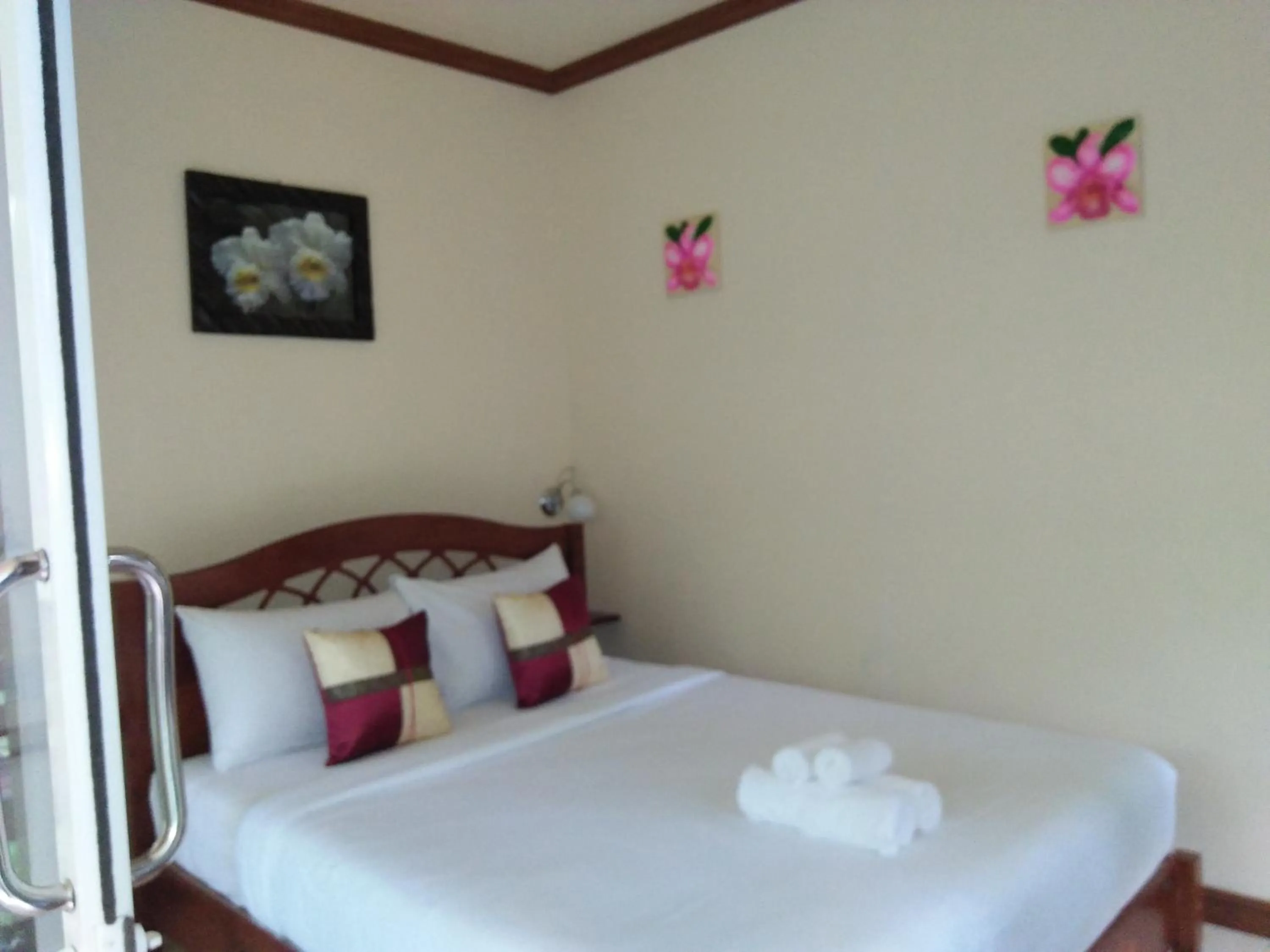 Bed in Khao Sok Palm Garden Resort