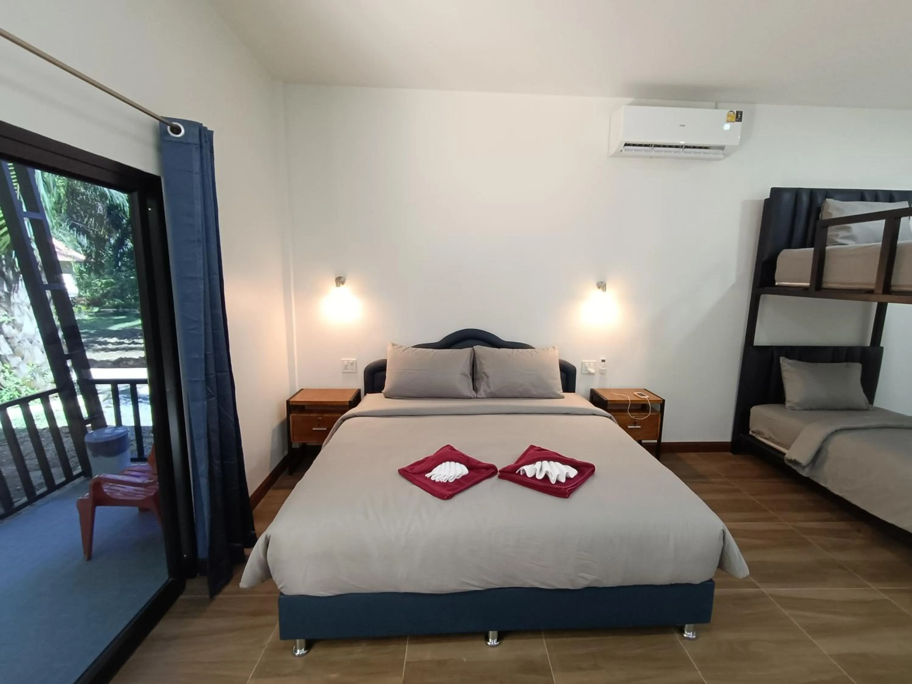 Bed in Khao Sok Palm Garden Resort