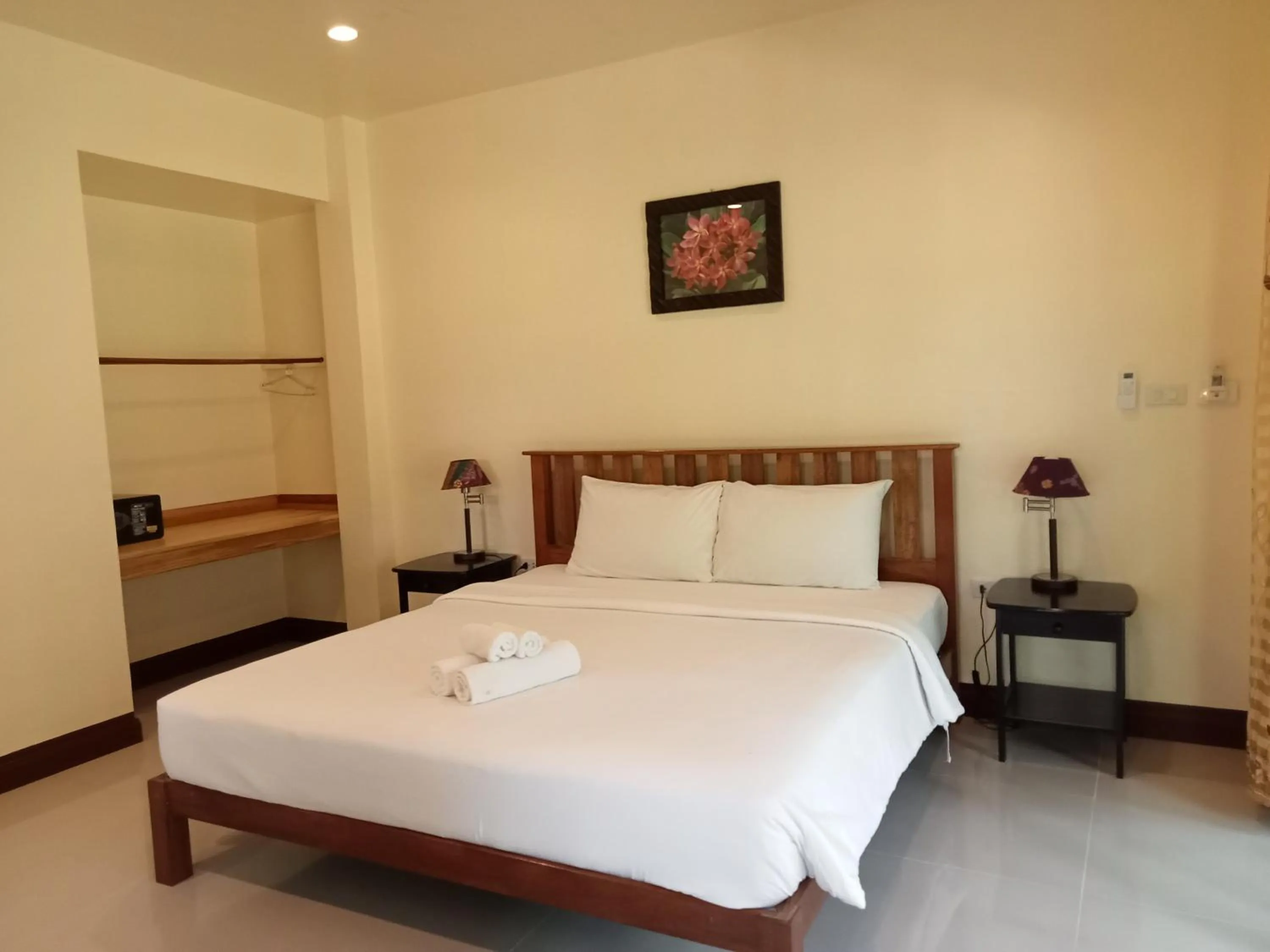 Bed in Khao Sok Palm Garden Resort