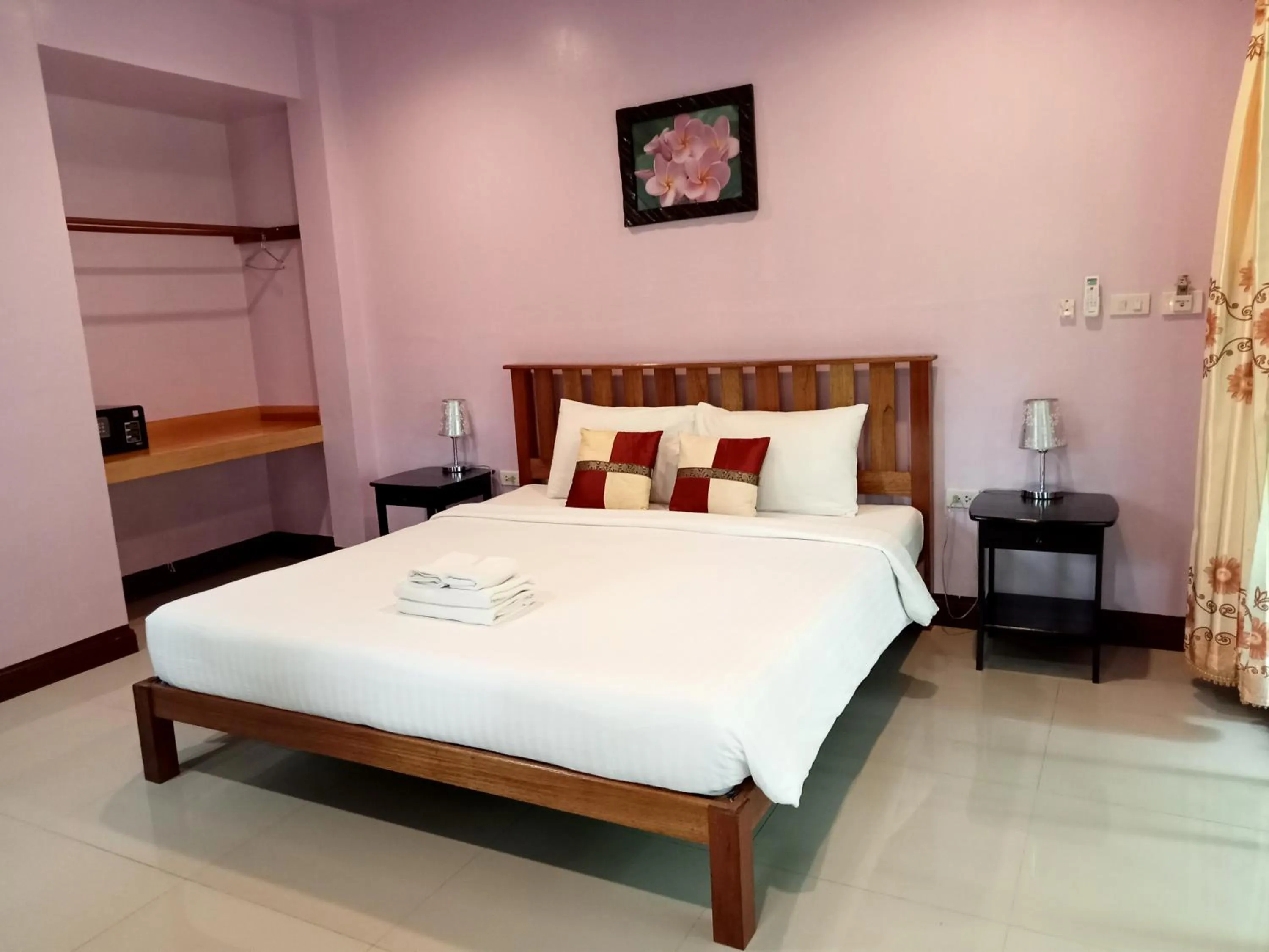 Bed in Khao Sok Palm Garden Resort