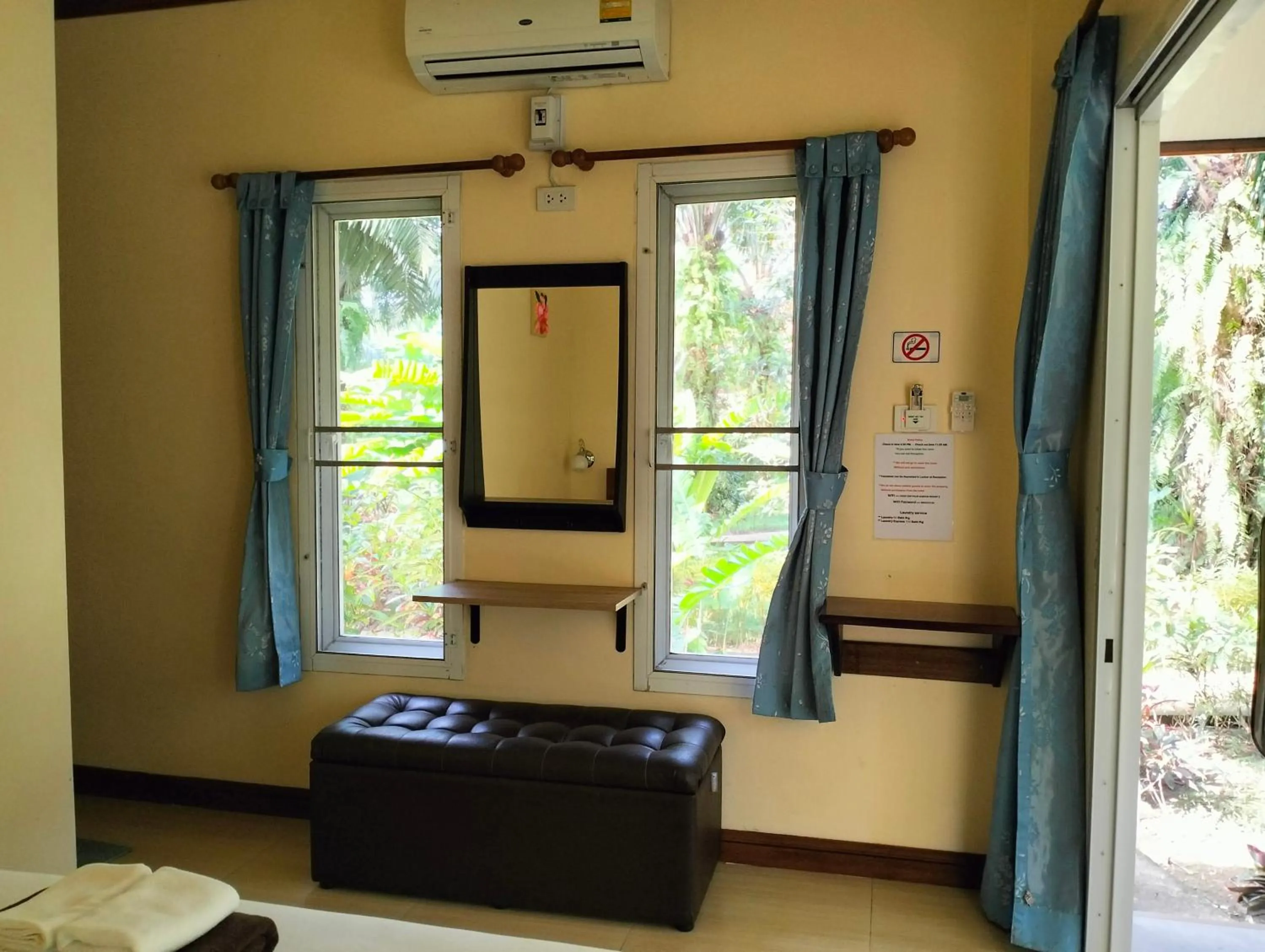 Bed in Khao Sok Palm Garden Resort