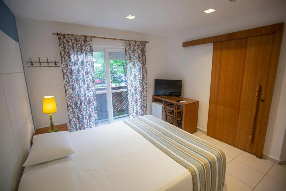 Photo of the whole room, Bed in Juquehy Praia Hotel