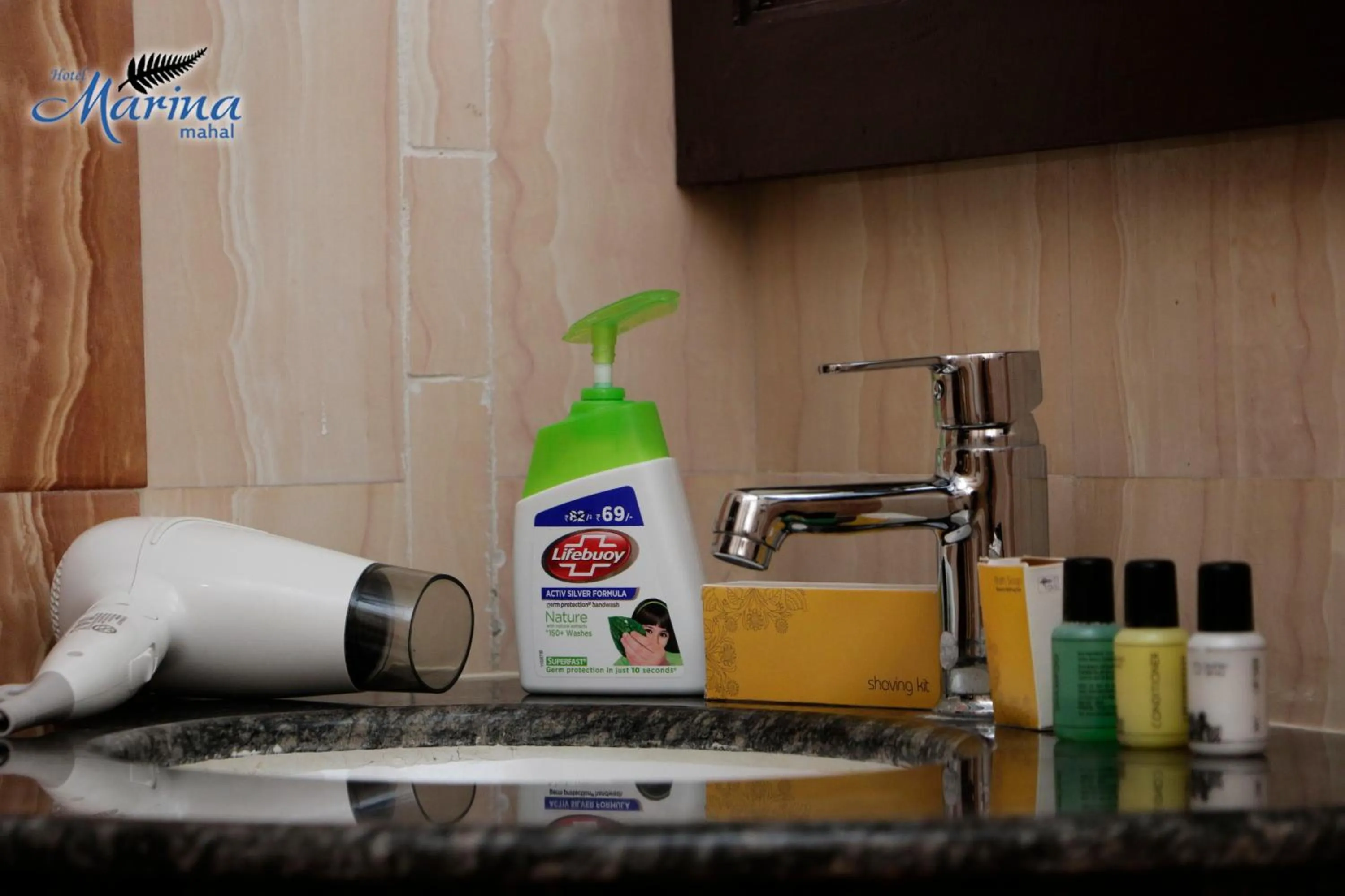 Bathroom in Hotel Marina Mahal with Swimming Pool
