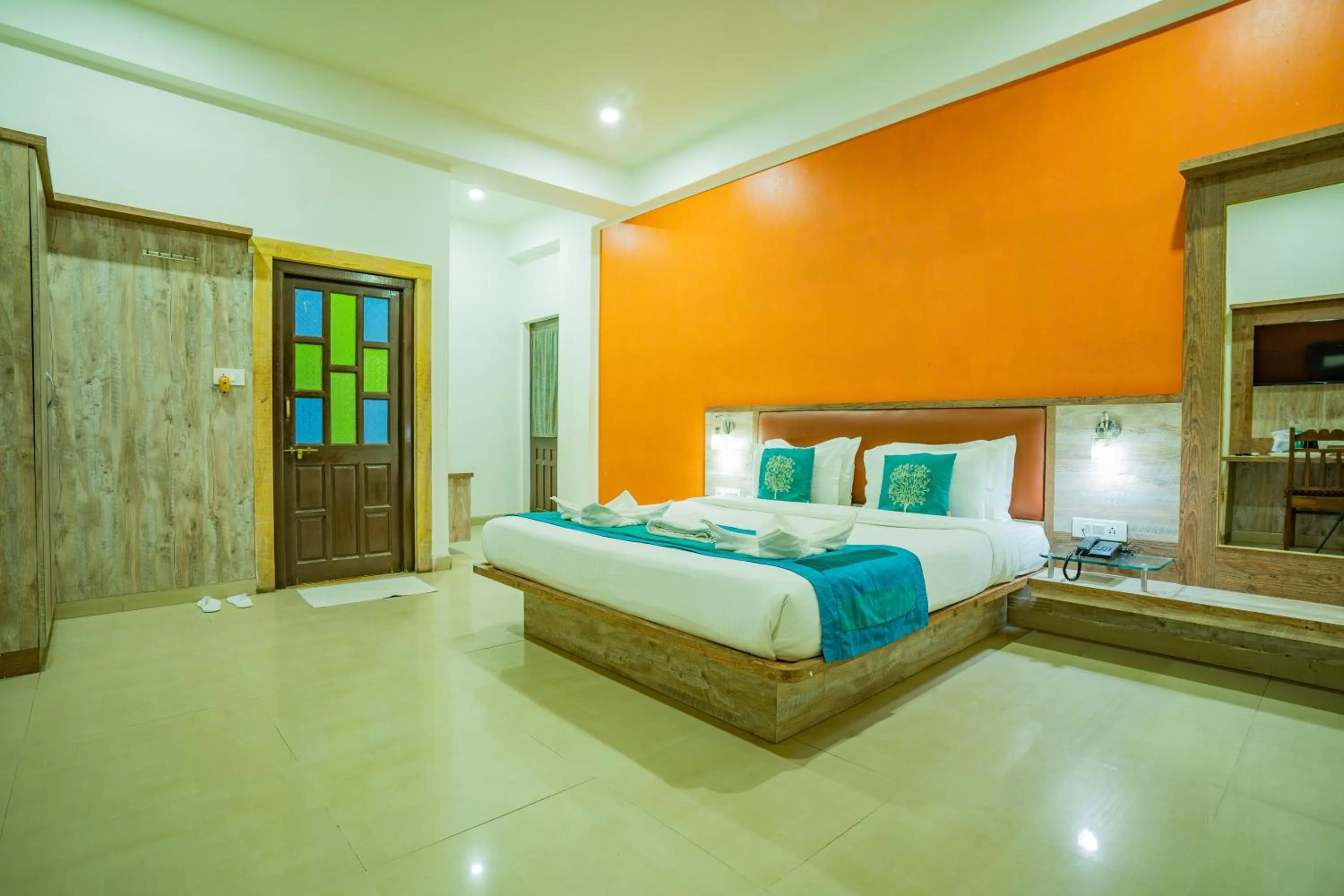 Bed in Hotel Marina Mahal with Swimming Pool