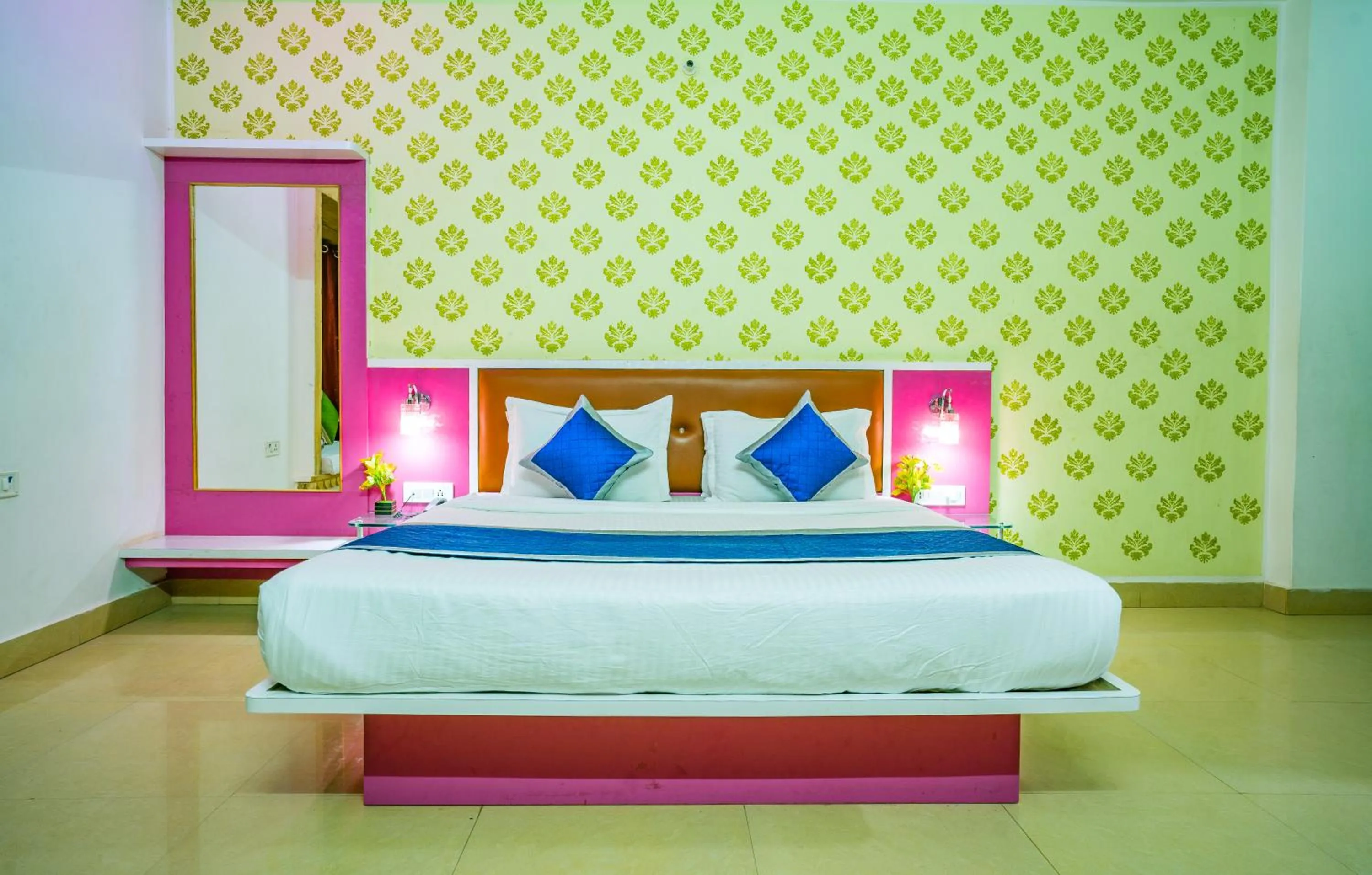 Bed in Hotel Marina Mahal with Swimming Pool