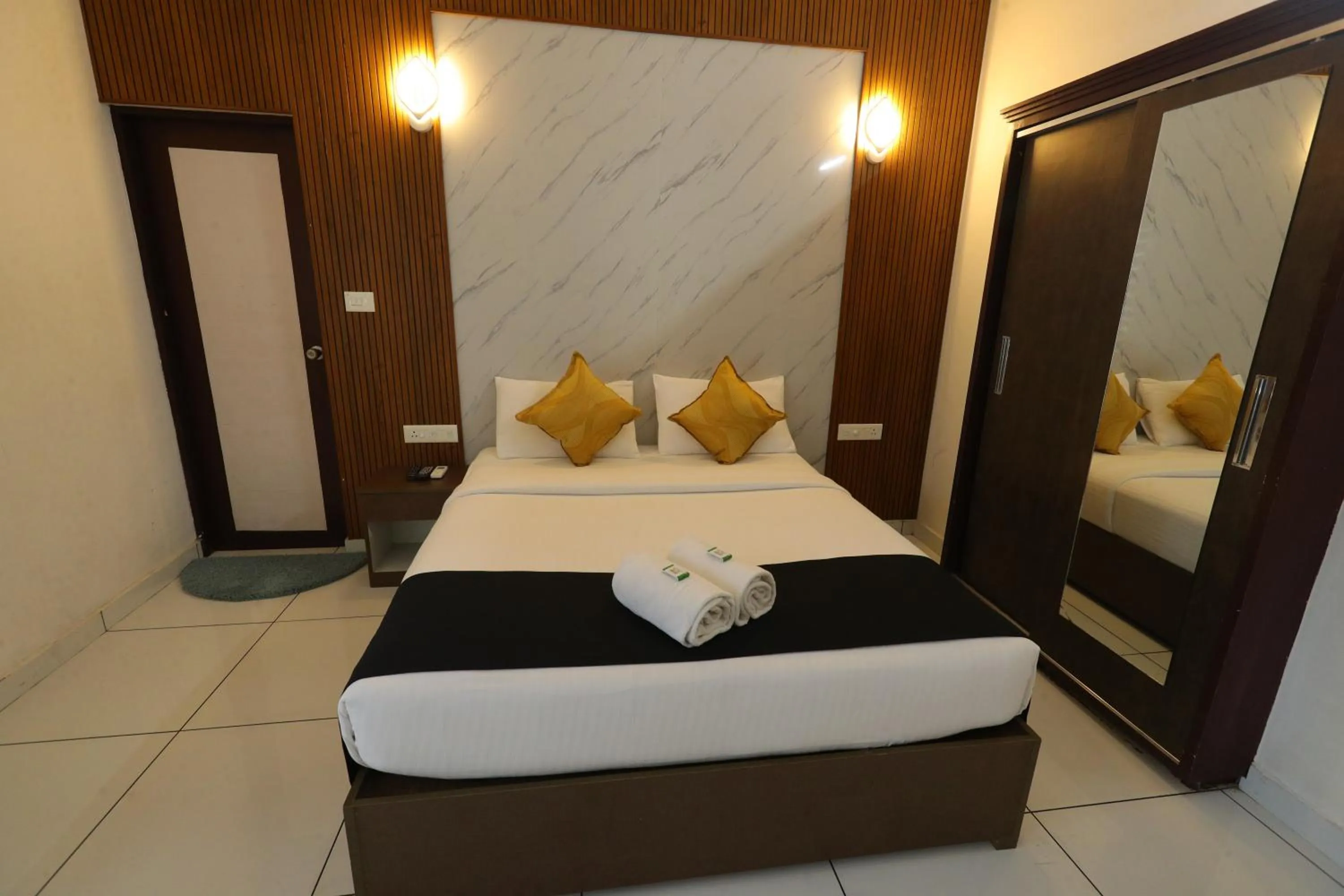 Bed in D-Green Hotels