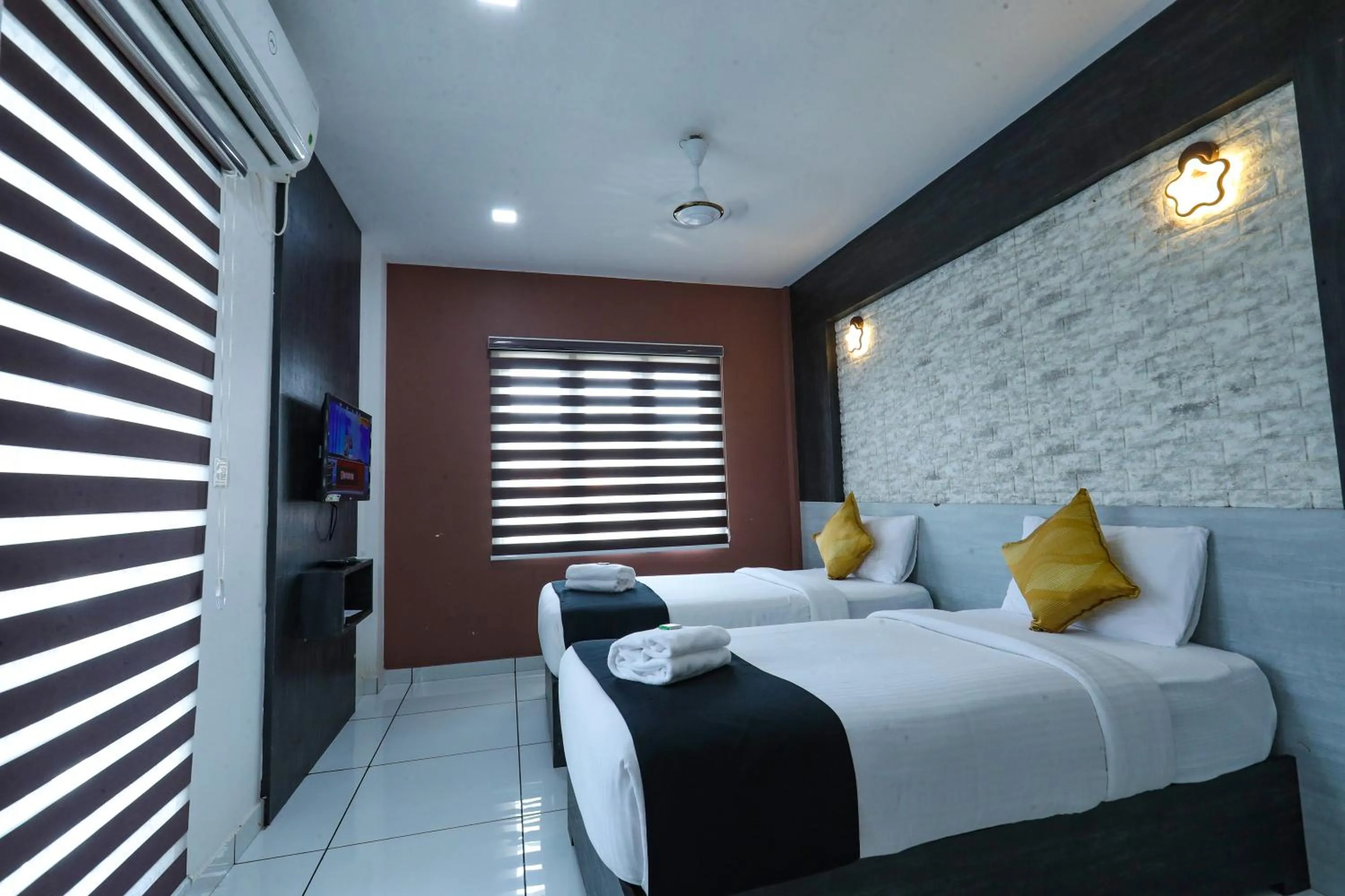 Bed in D-Green Hotels