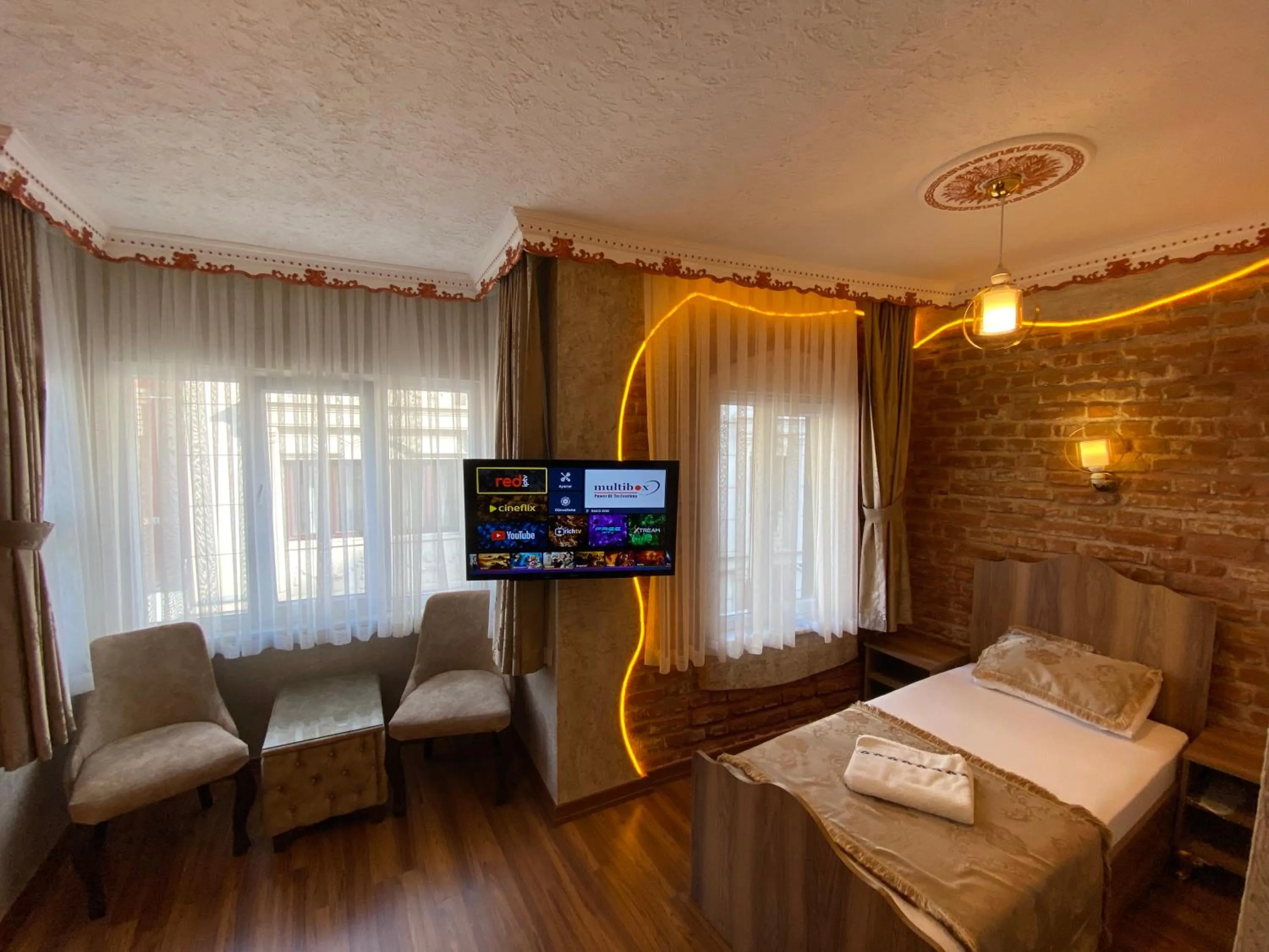 Bed in GOLDEN ARROW OLD CİTY HOTEL