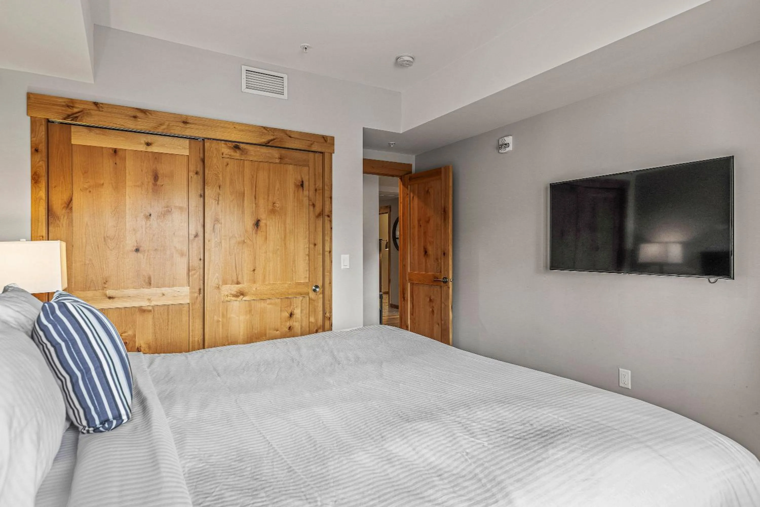 Bed in Spring Creek Condo by Canadian Rockies Vacation Rentals